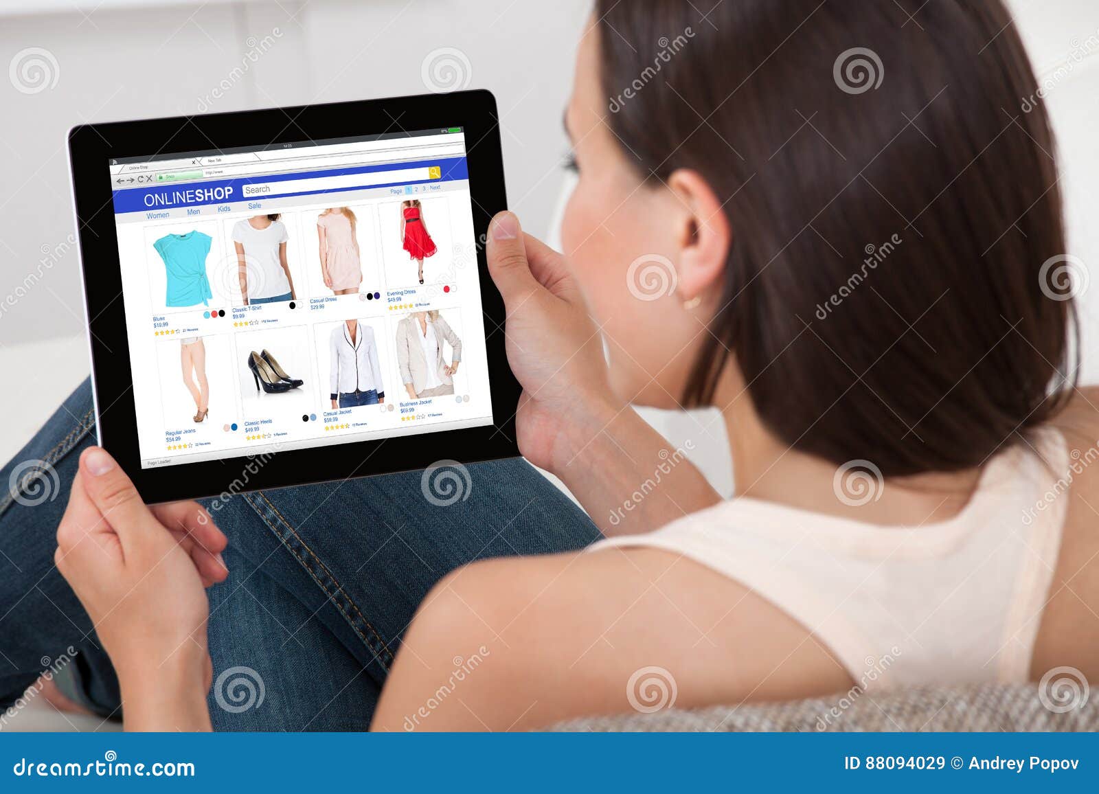 woman doing online shopping on digital tablet