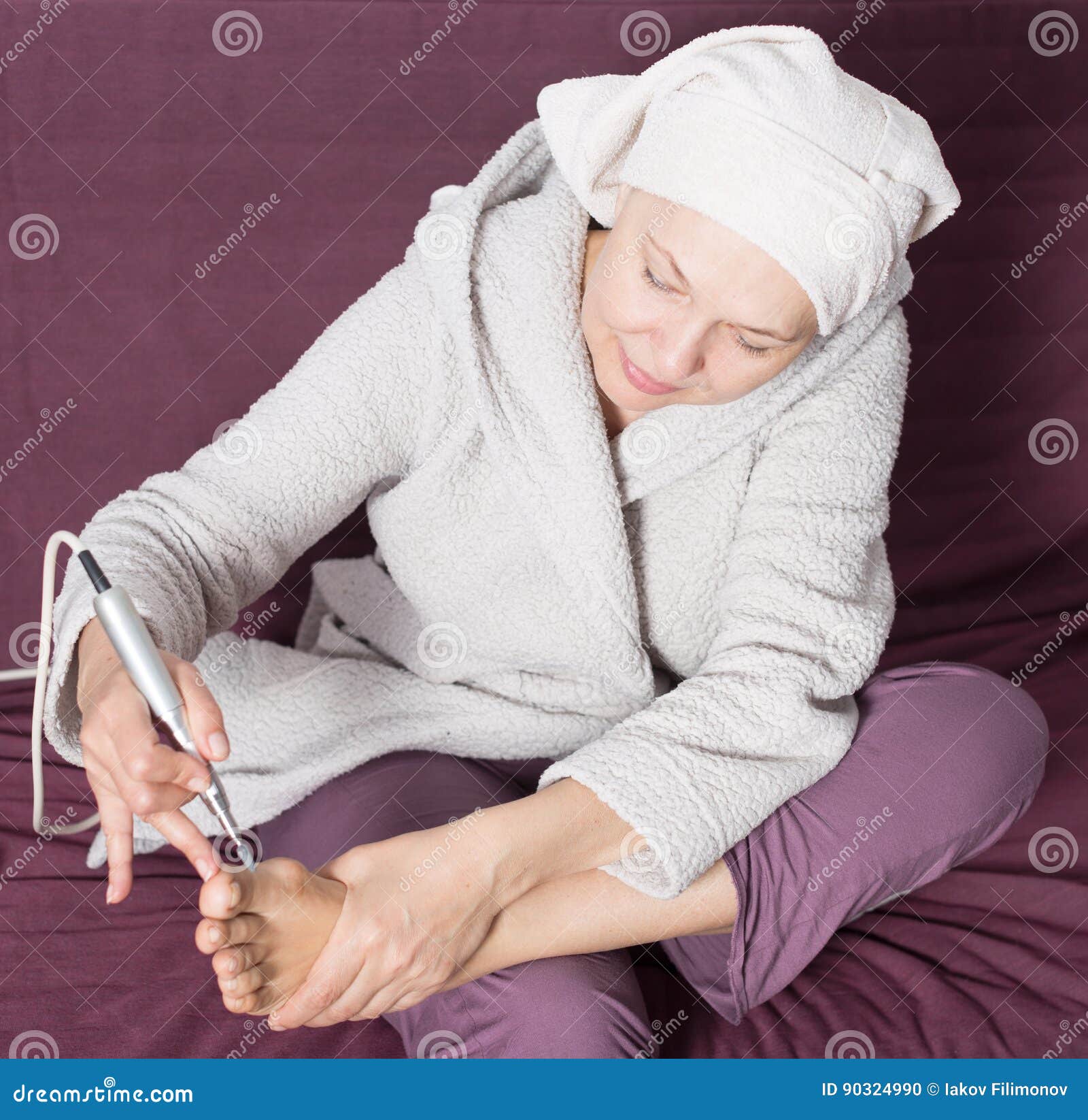 Woman doing pedicure stock photo. Image of elderly, nail 90324990
