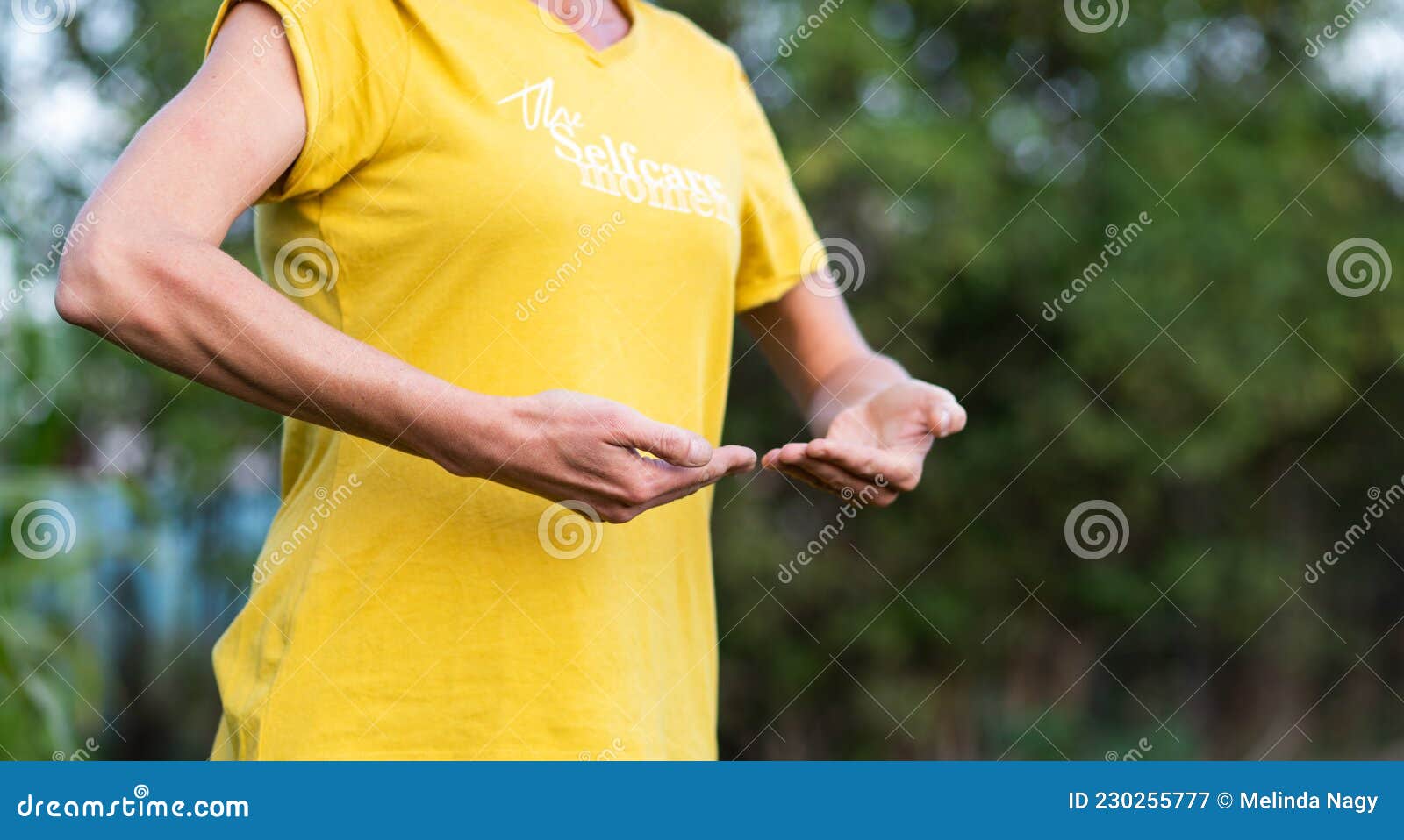 woman doing qi gong outdoors