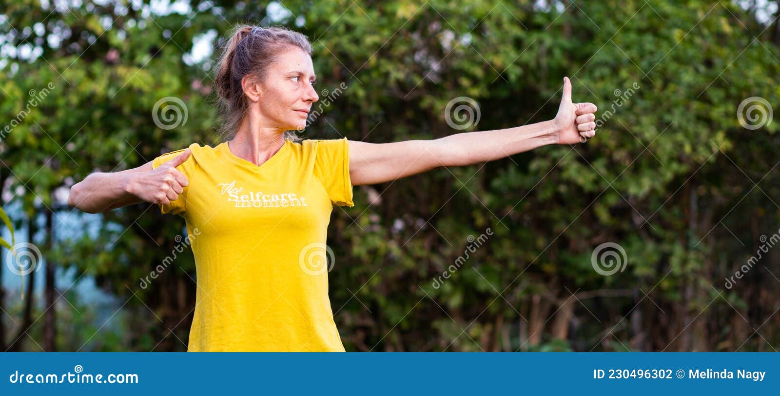 woman doing qi gong outdoors