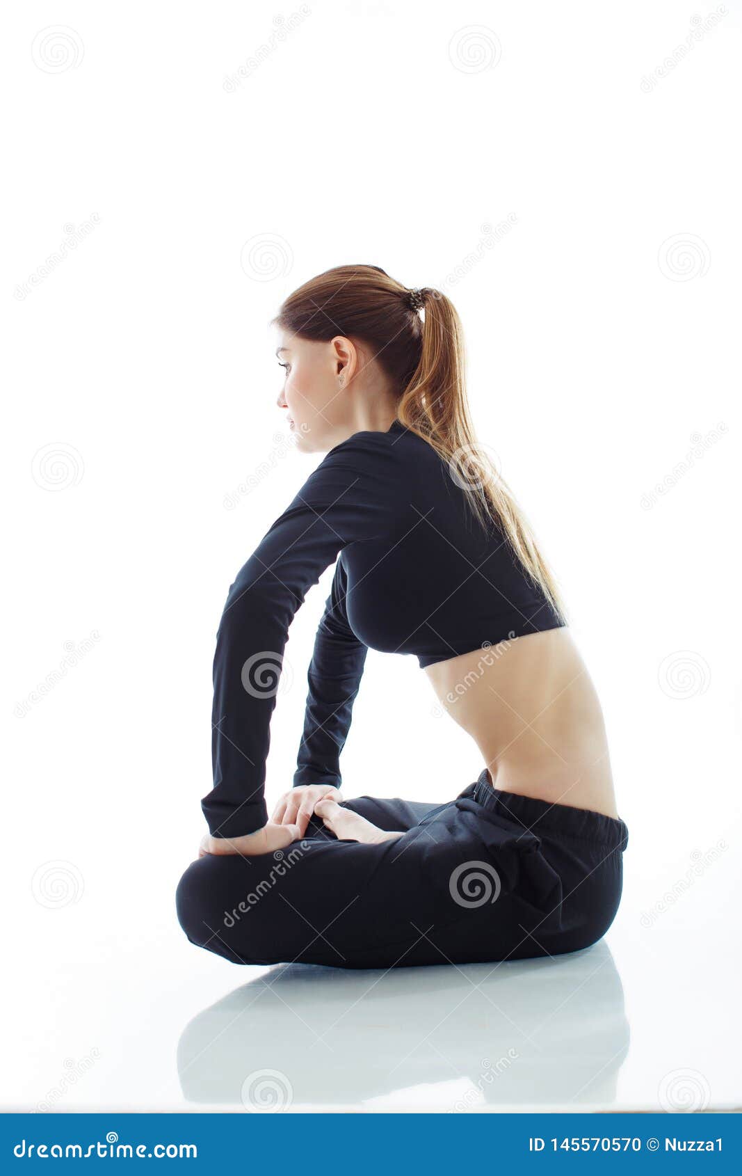 woman doing vacuum abdomen white background studio woman makes stomach vacuum 145570570