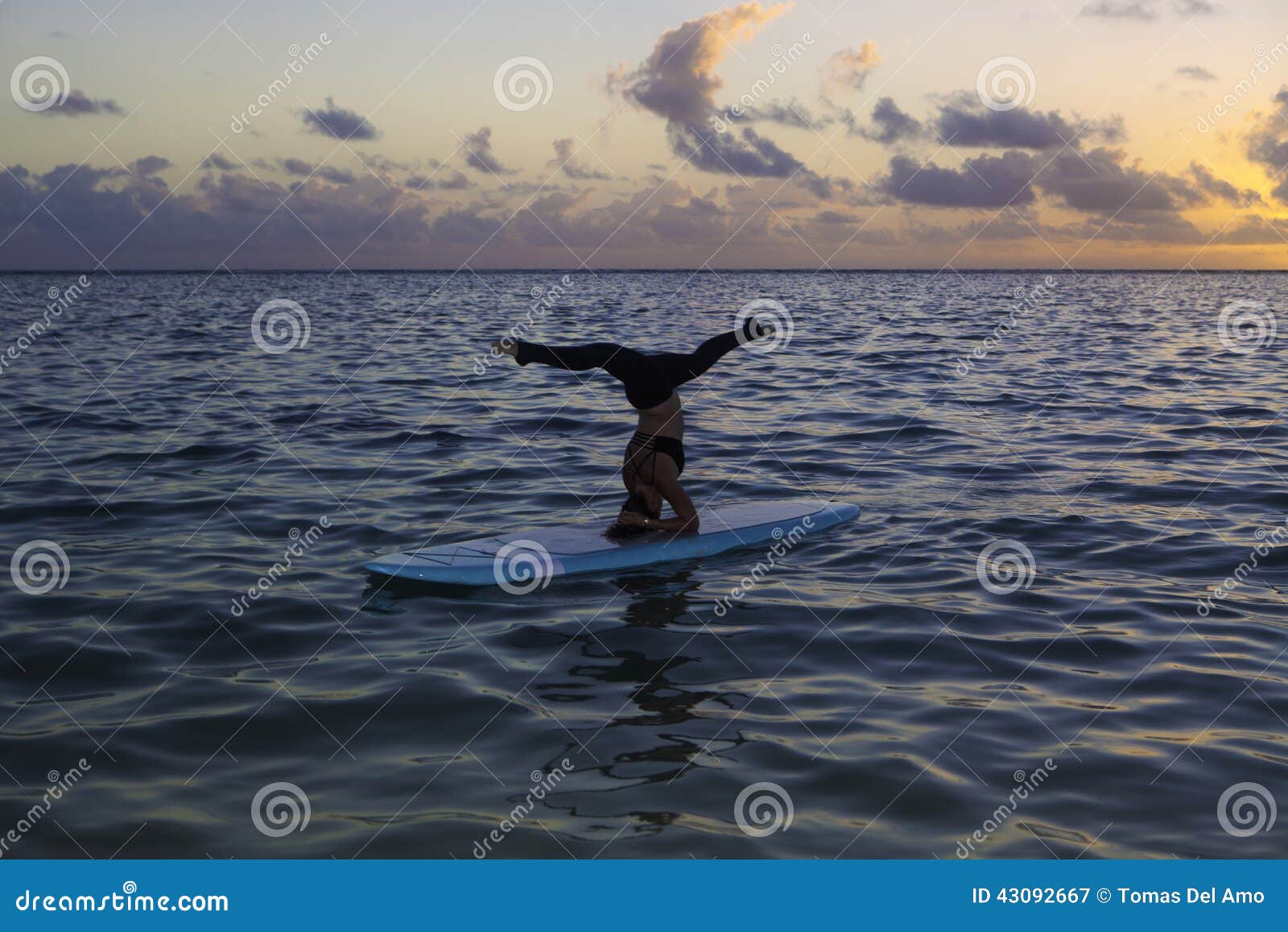 Woman Doing Yoga on a Paddle Board Stock Image - Image of calm, workout ...