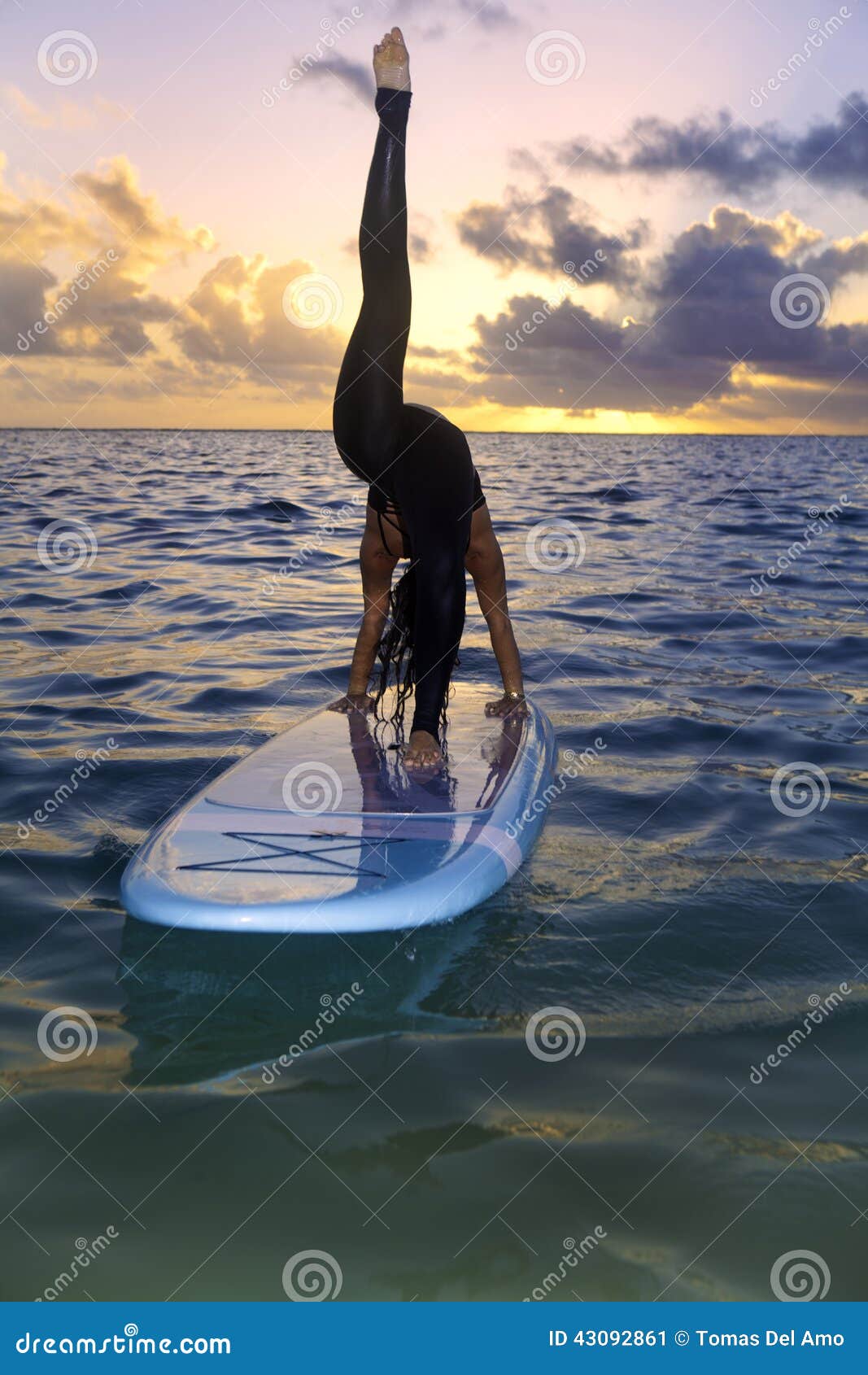 Woman Doing Yoga on a Paddle Board Stock Image - Image of exercise ...