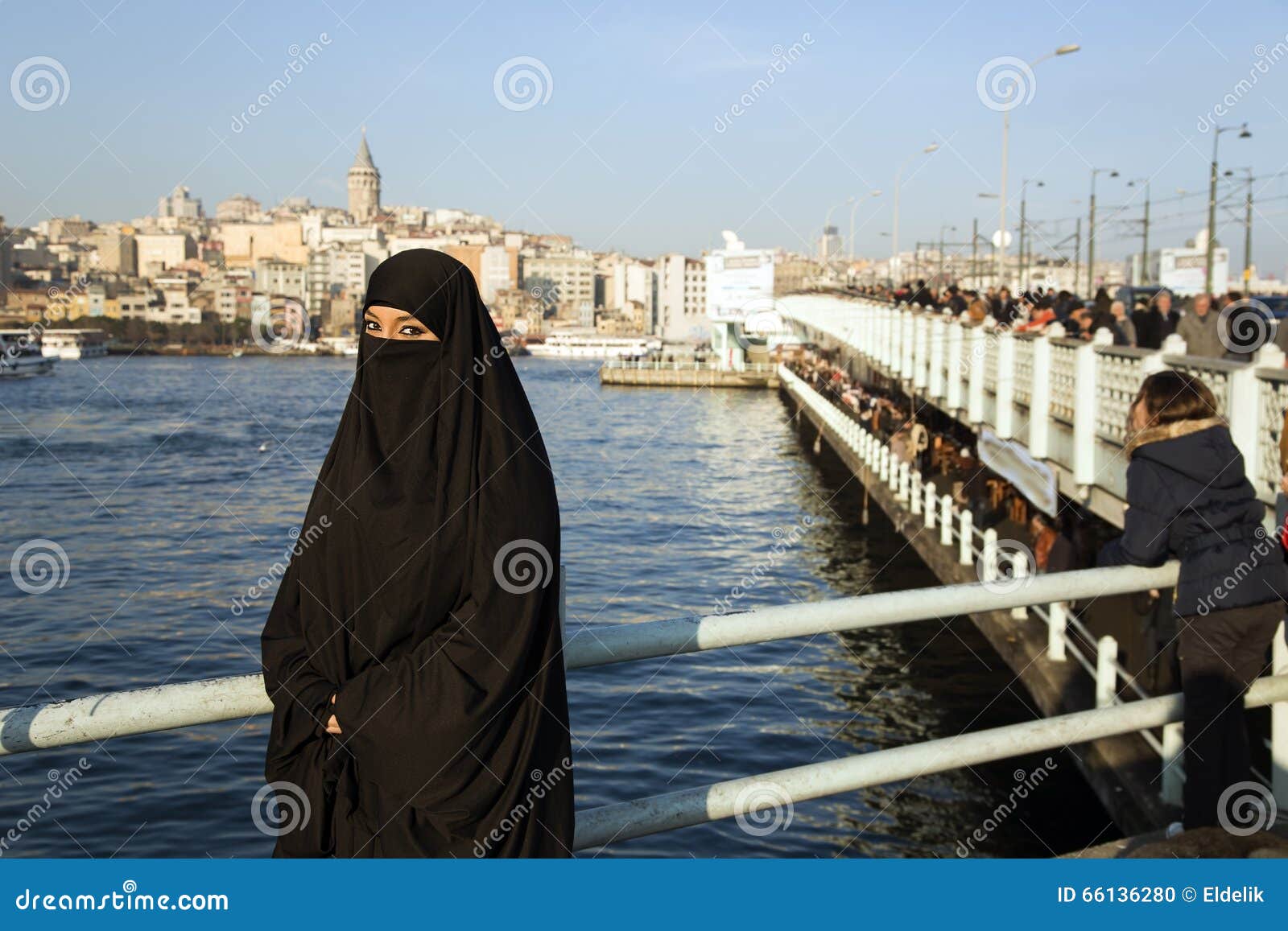 Woman Dressed With Black Headscarf Chador On Istanbul