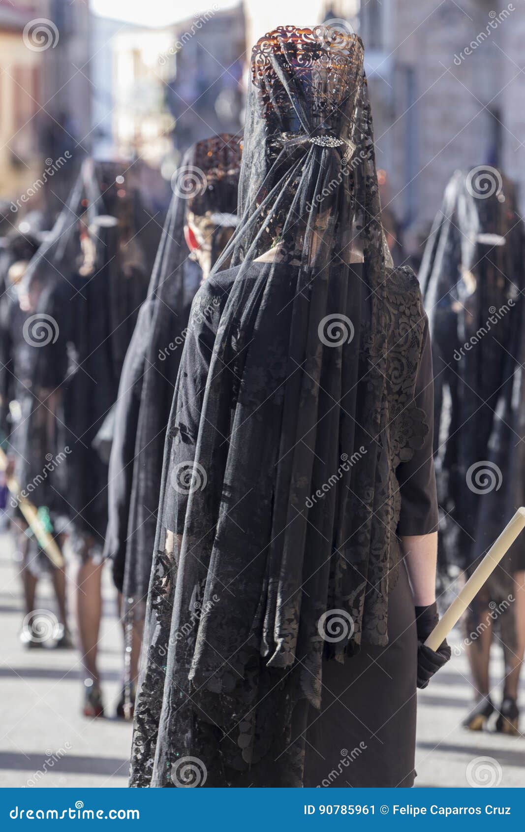 woman dressed in mantilla during a procession of holy week