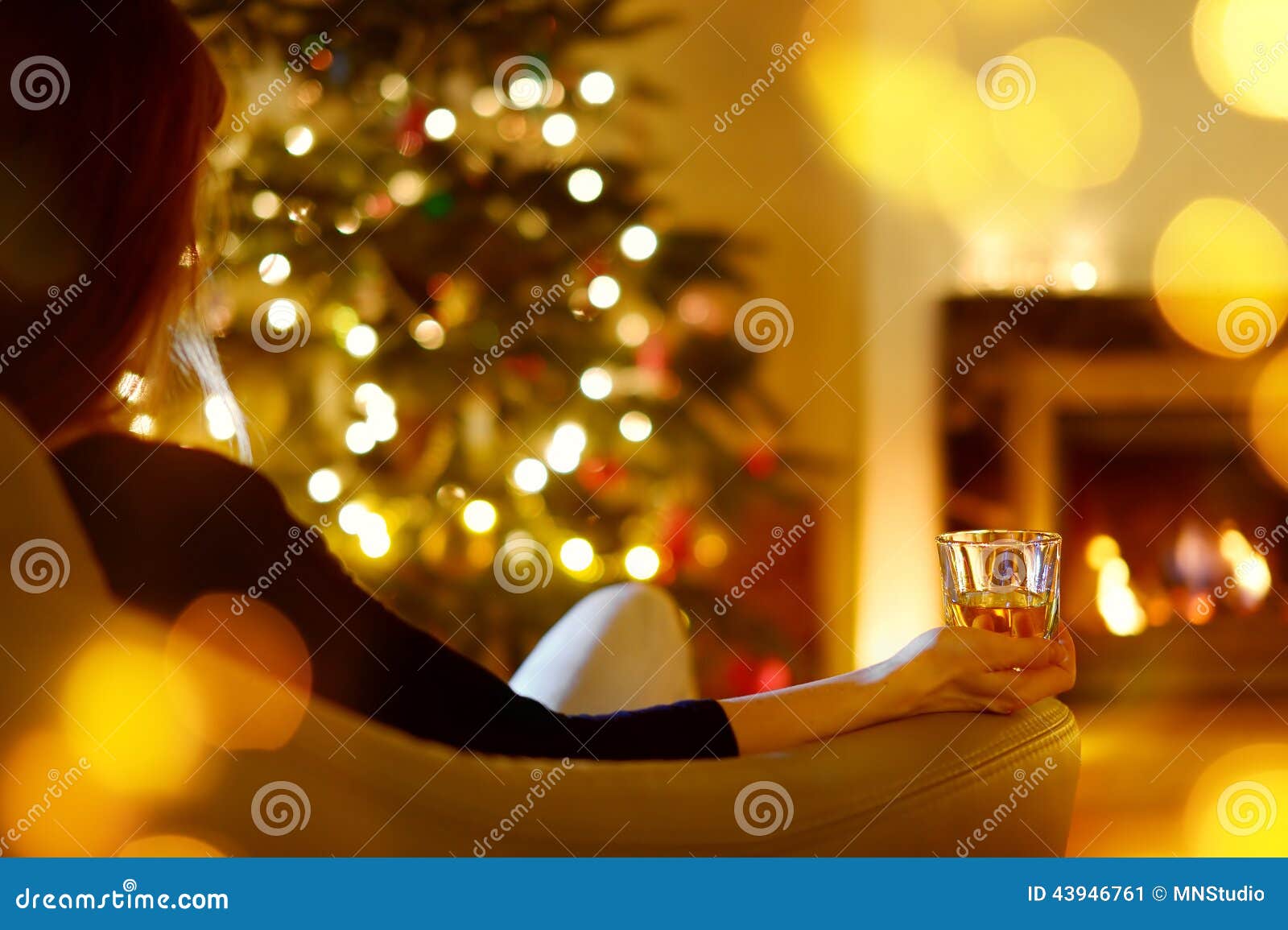 Woman with a Drink by a Fireplace on Christmas Stock Image - Image of ...