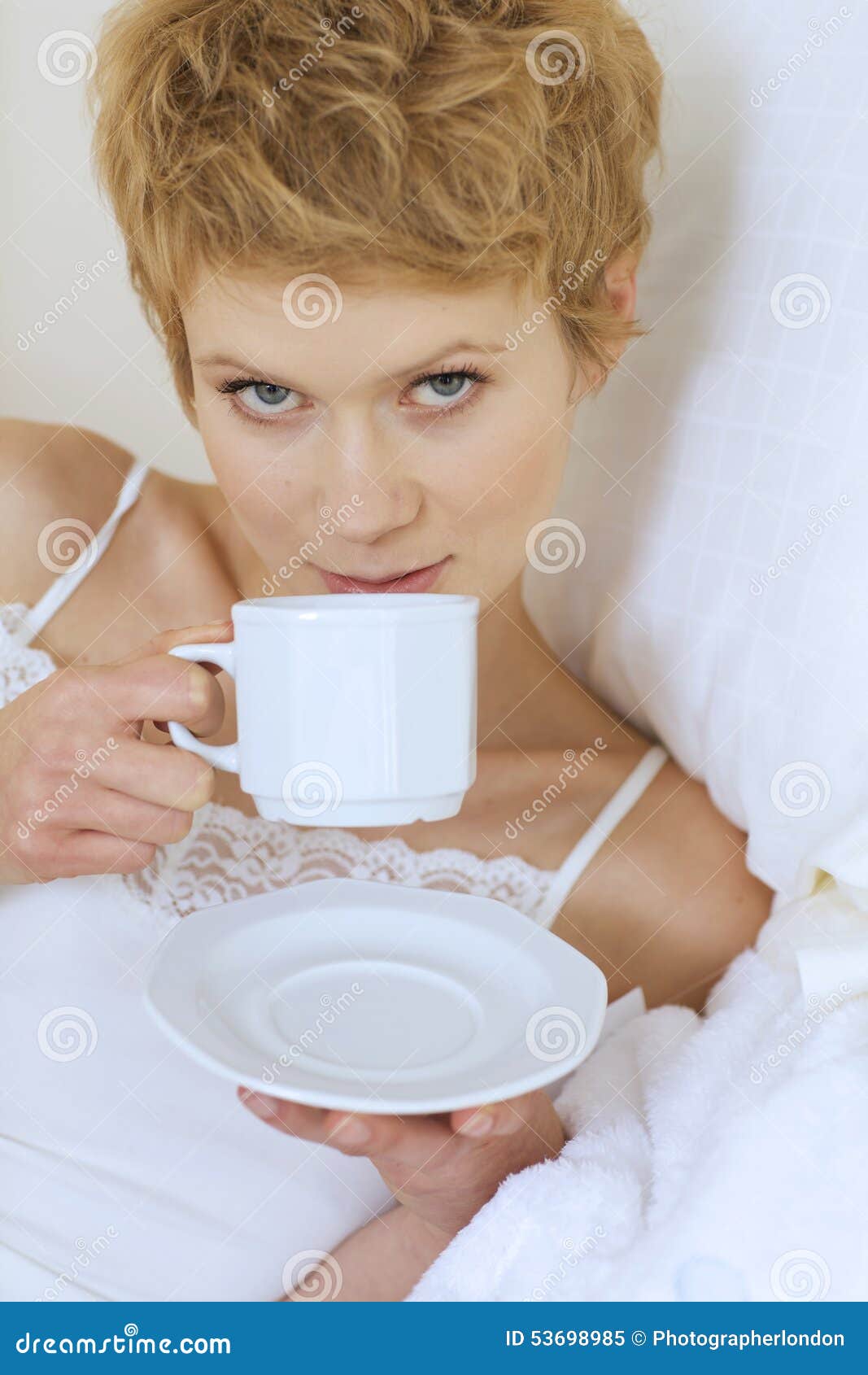 Woman Drinking Coffee in Bed Stock Image Image of coffee, twenties