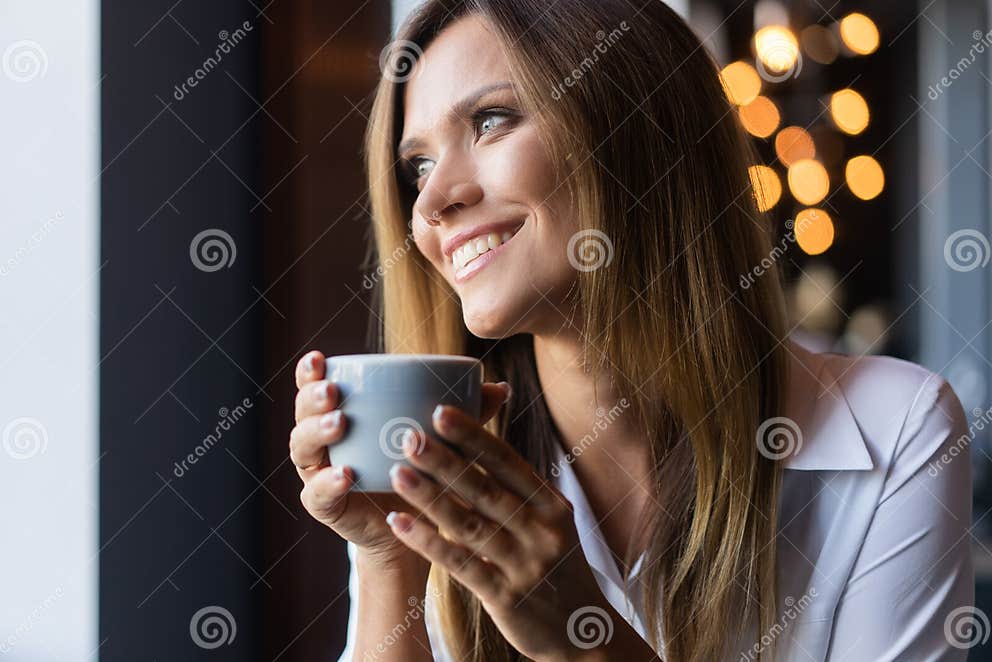 Woman Drinking Coffee in the Morning at Restaurant Stock Photo - Image ...