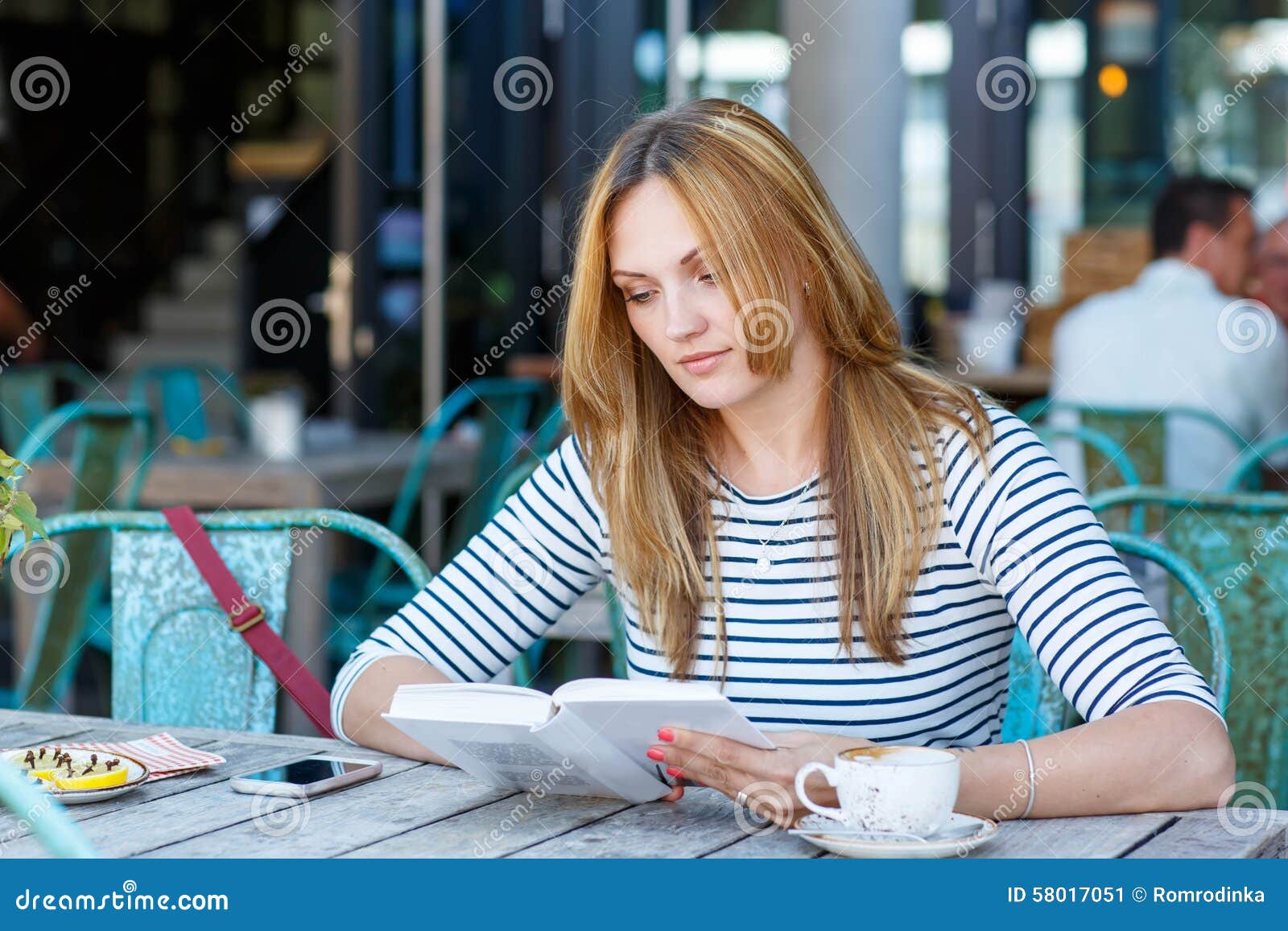 Woman Drinking Coffee and Reading Book in Cafe Stock Image - Image of ...