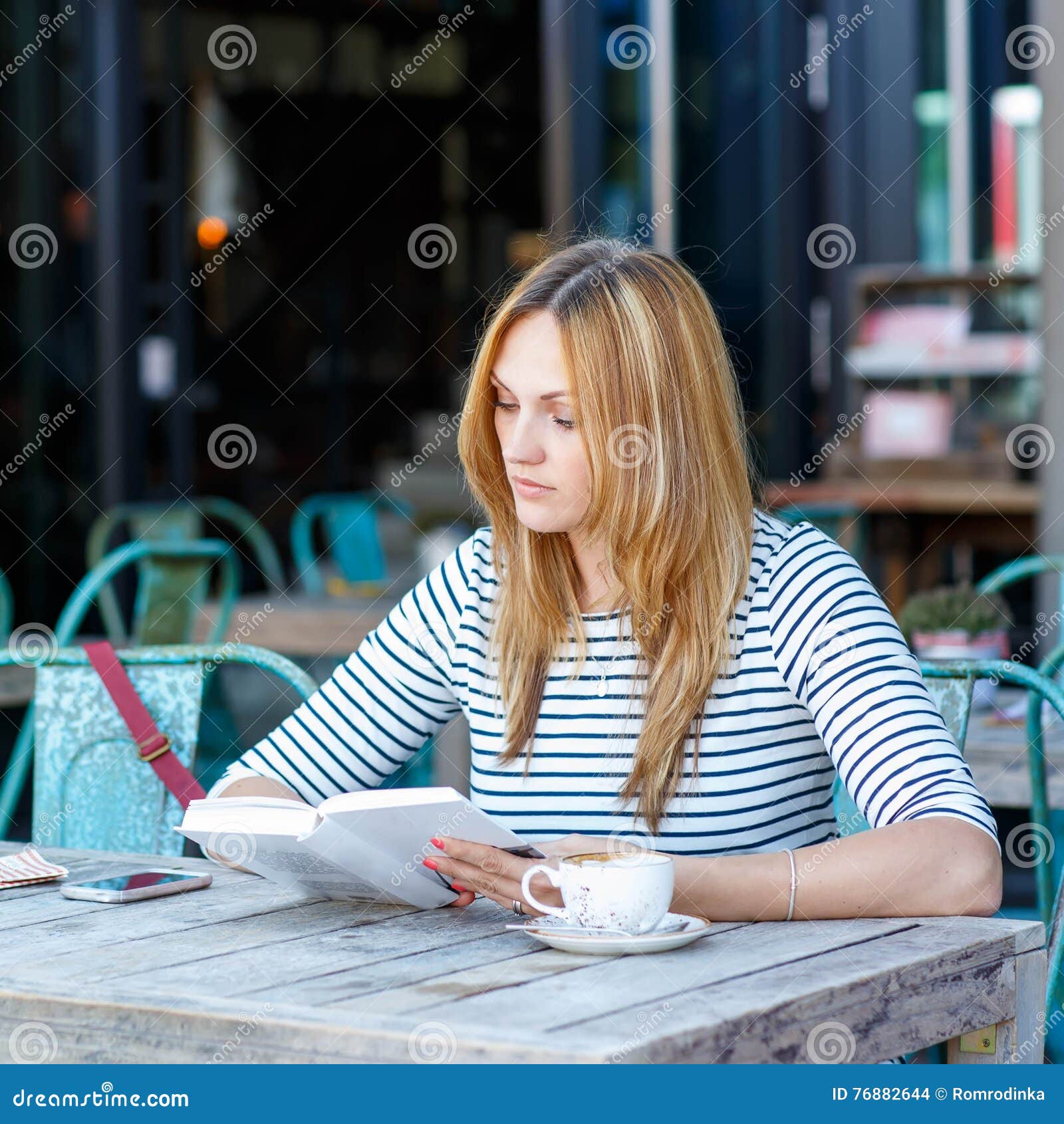 Woman Drinking Coffee and Reading Book in Cafe Stock Photo - Image of ...