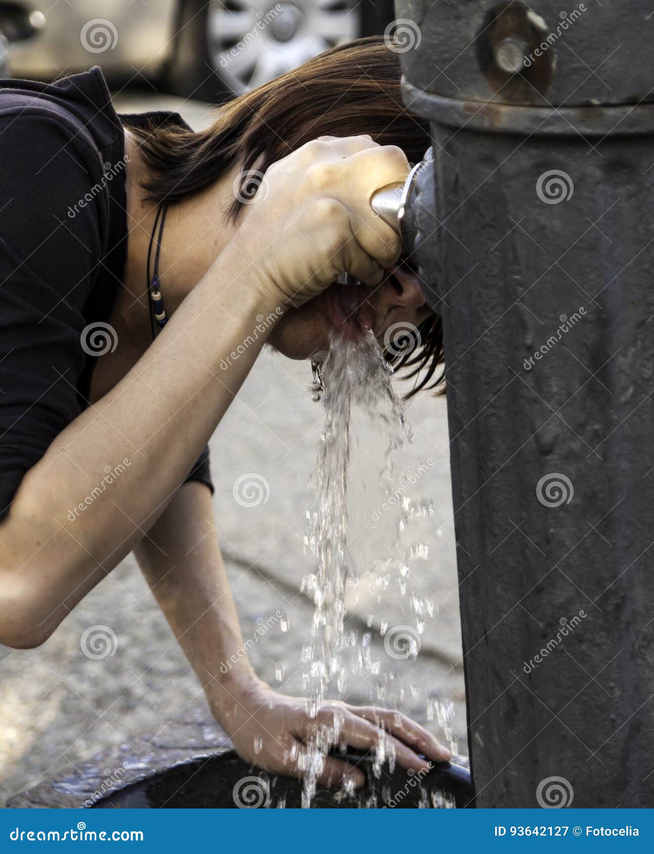 Woman drinking fountain stock image. Image of beauty 93642127