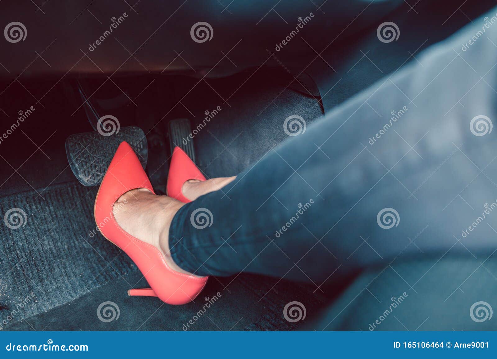 Woman Driving a Car in an Unsafe Manner with High-heel Shoes Stock ...