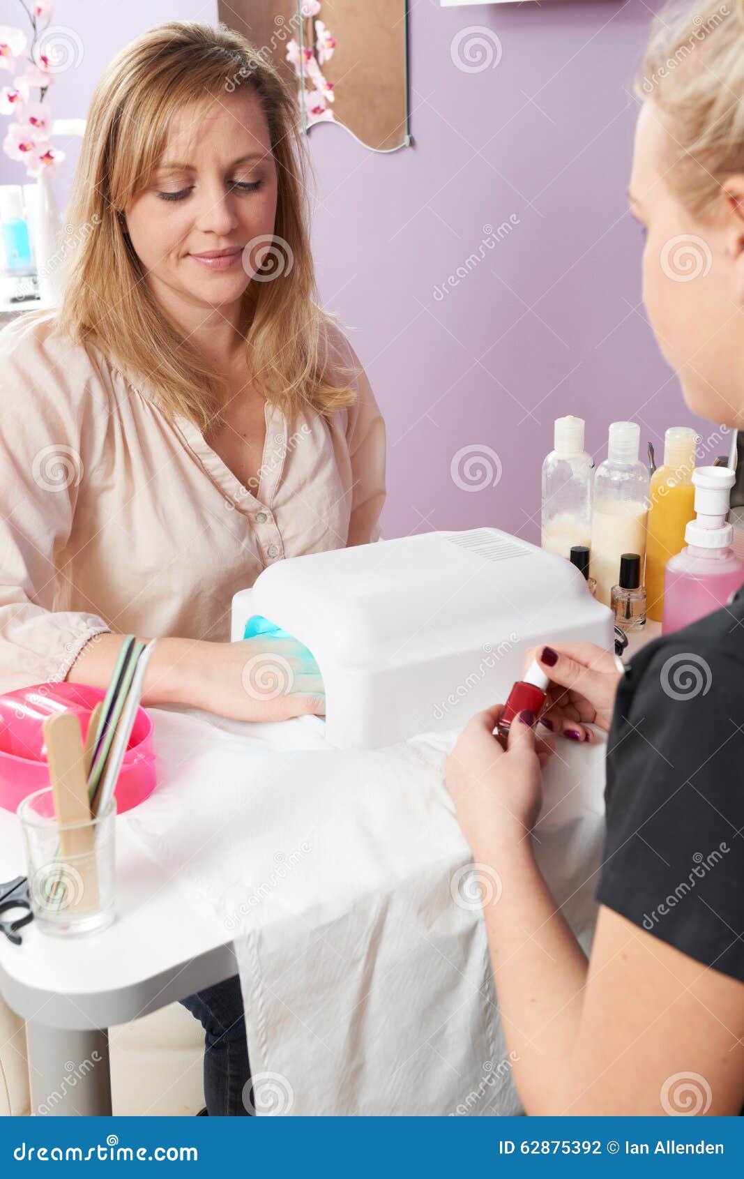 Woman Drying Nails after Manicure Treatment Stock Photo Image of