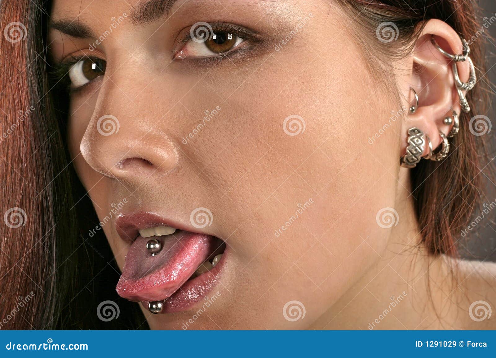 woman with ear-rings and studs