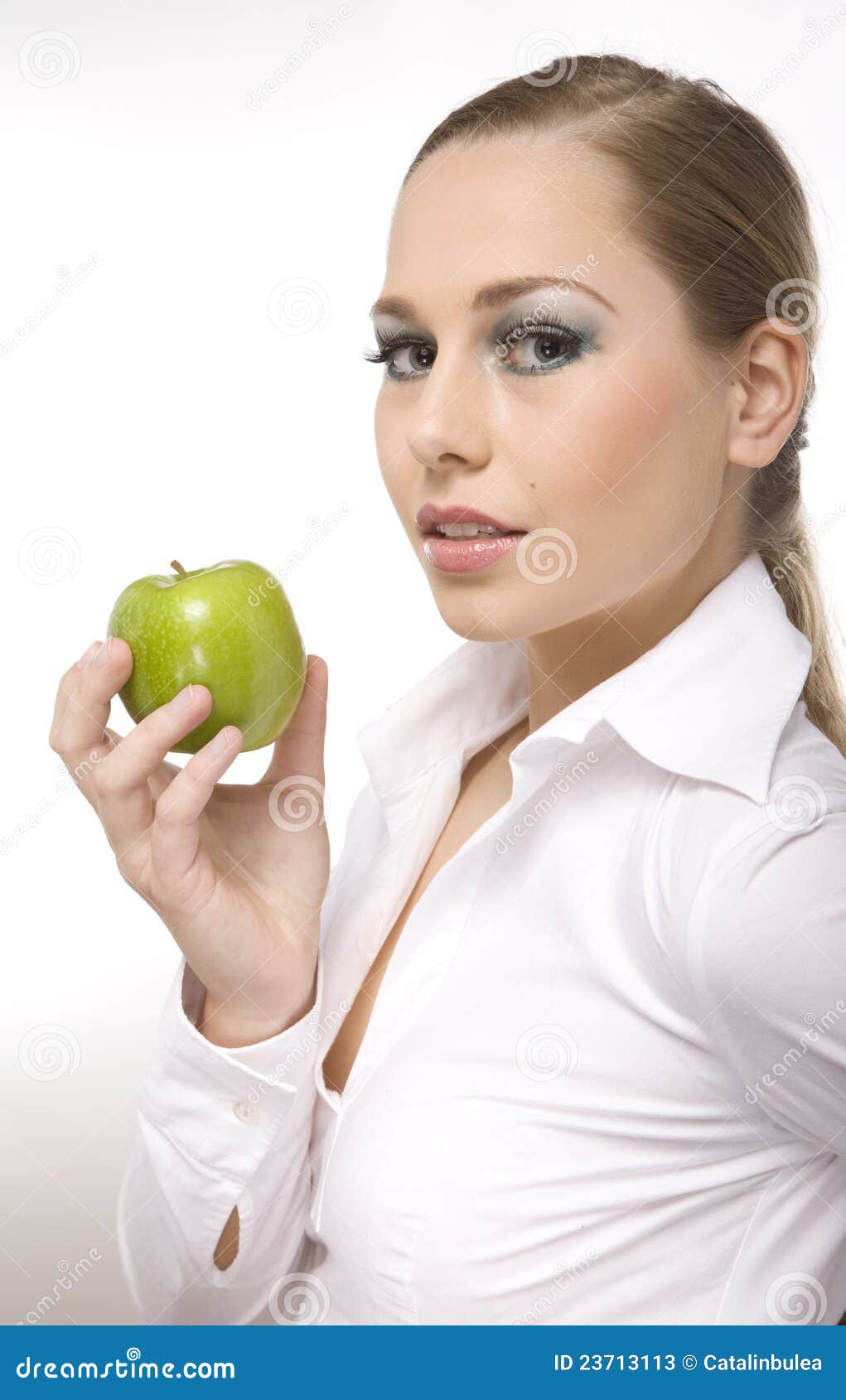 Woman eat green apple stock image. Image of lovely, green 23713113