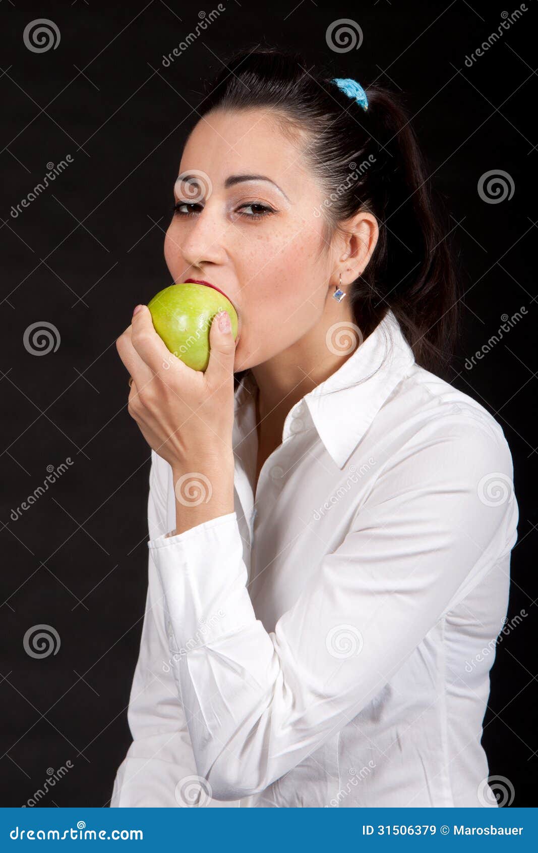 Woman eat green apple stock image. Image of happiness 31506379