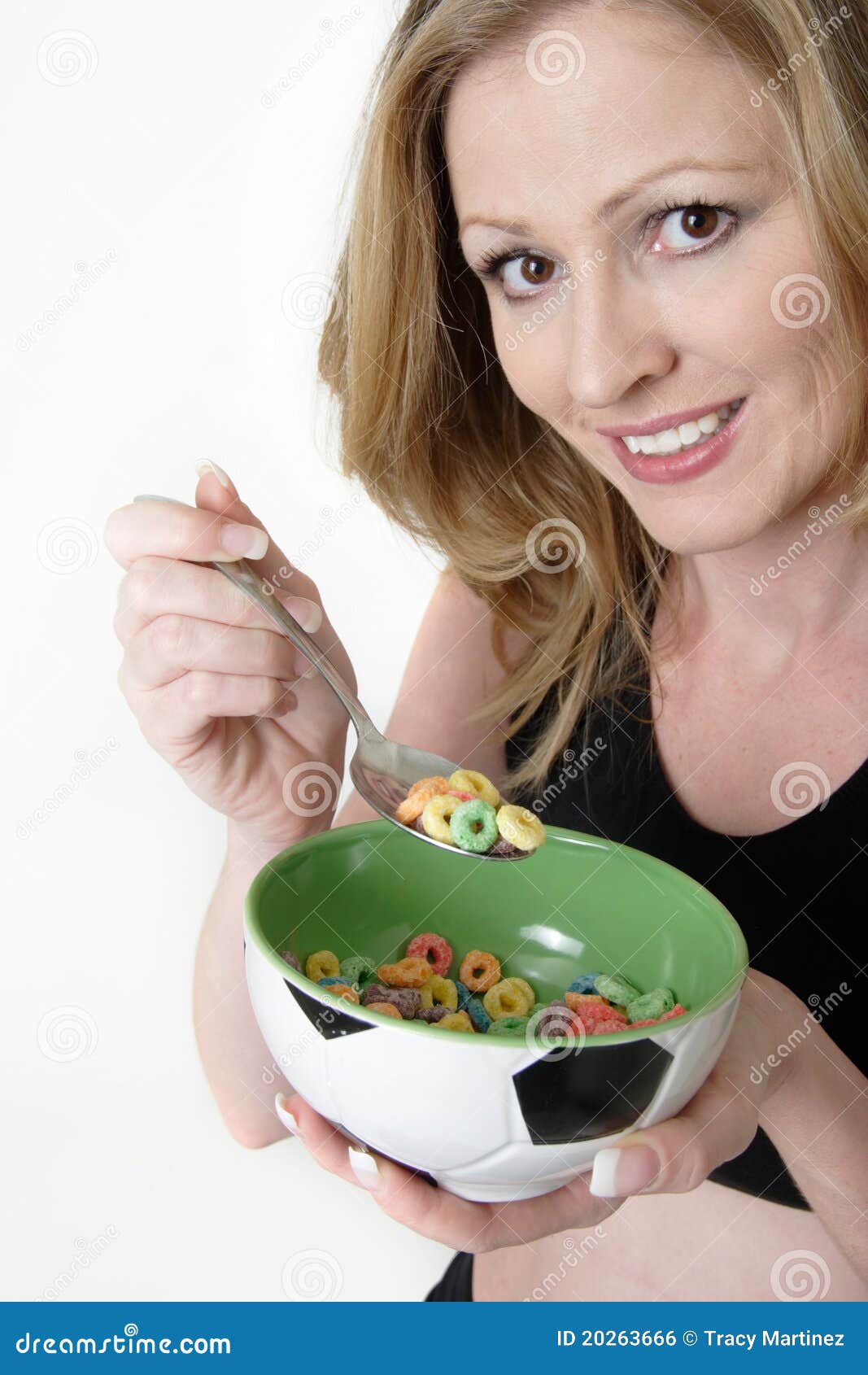 Woman Eating a Bowl of Cereal Stock Photo Image of happy, woman 20263666