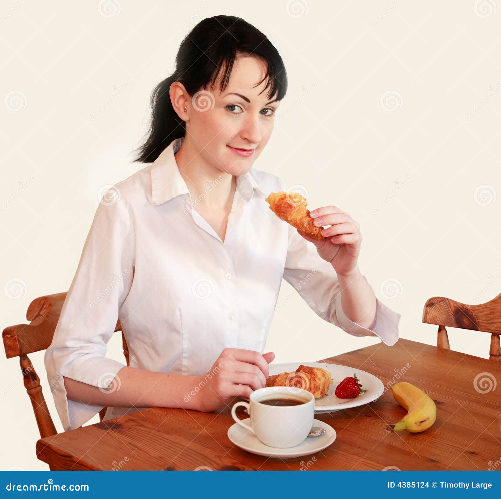 Woman eating breakfast stock photo. Image of closeup, food - 4385124