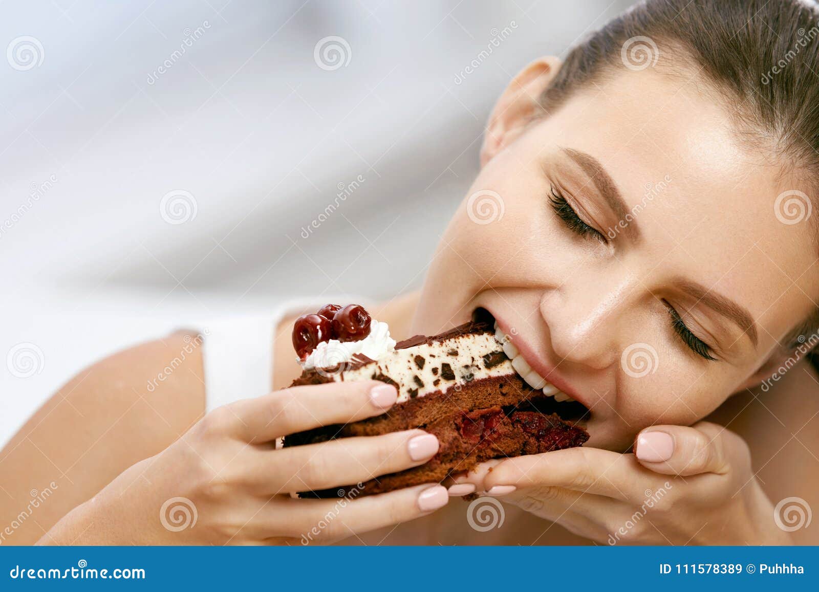 woman eating cake. beautiful female eating dessert