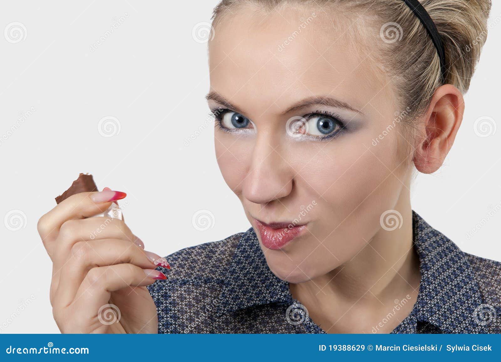 Woman eating chocolate stock image. Image of white, eating 19388629