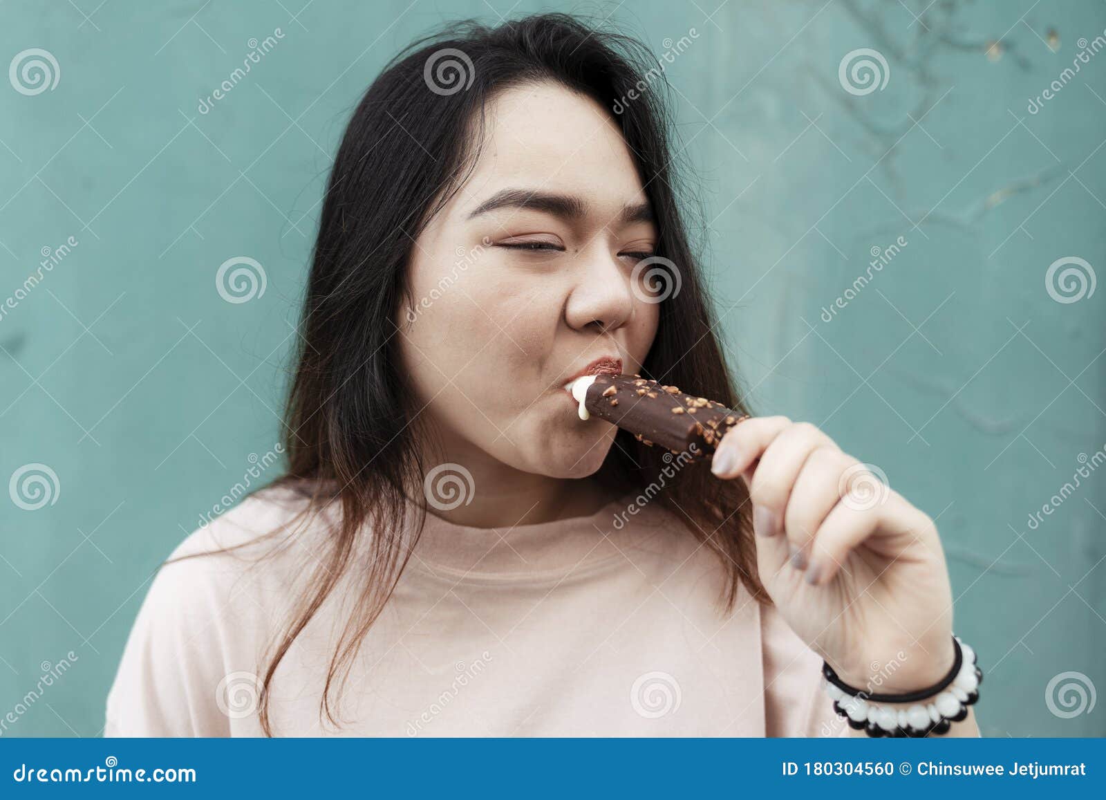 Woman Eating Chocolate Ice Cream Stock Photo Image of asian, melting