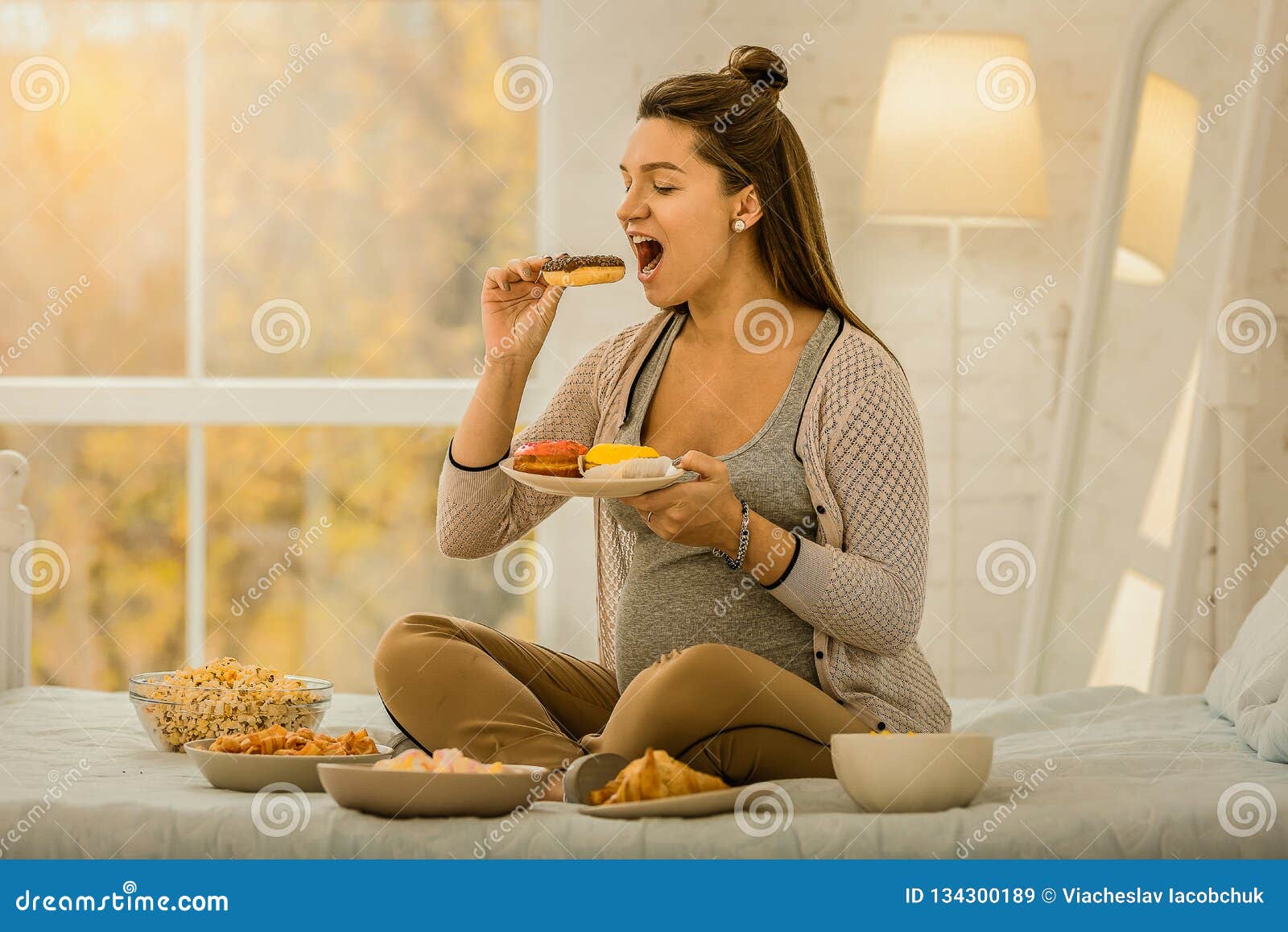 Woman Eating A Lot Of Food While Pregnancy Stock Image - Image of caucasian, motherhood: 134300189