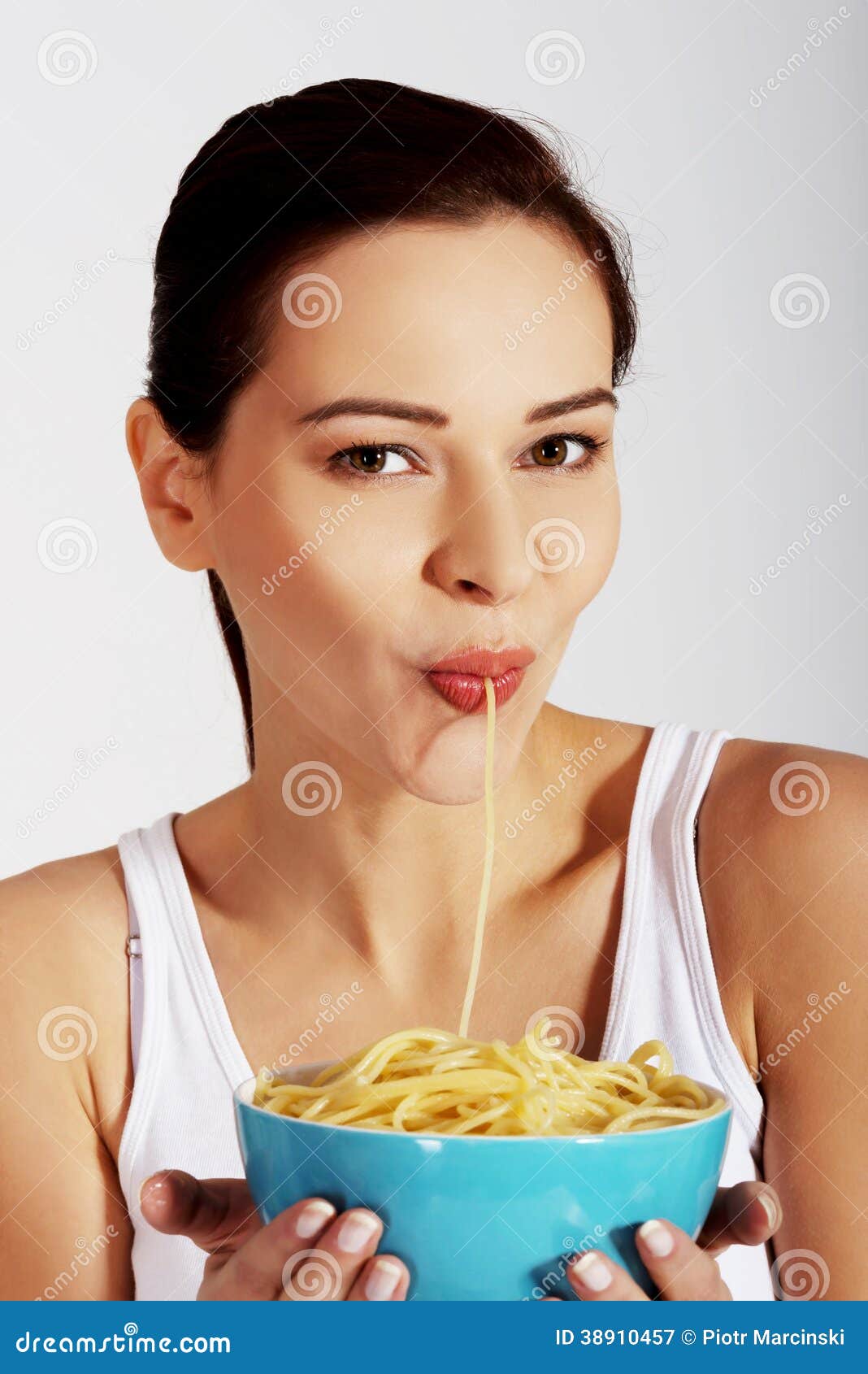 Woman Eating Pasta from a Bowl. Stock Image Image of hungry, dinner