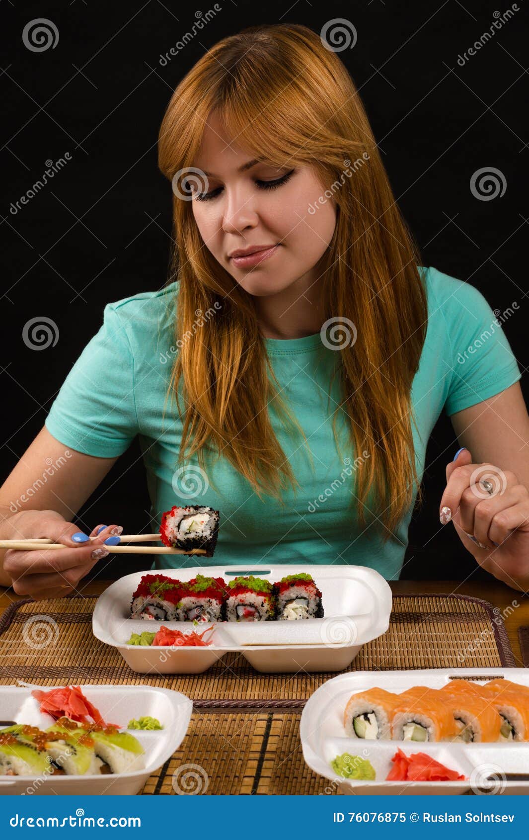 Woman eating rolls stock image. Image of isolated, plate - 76076875