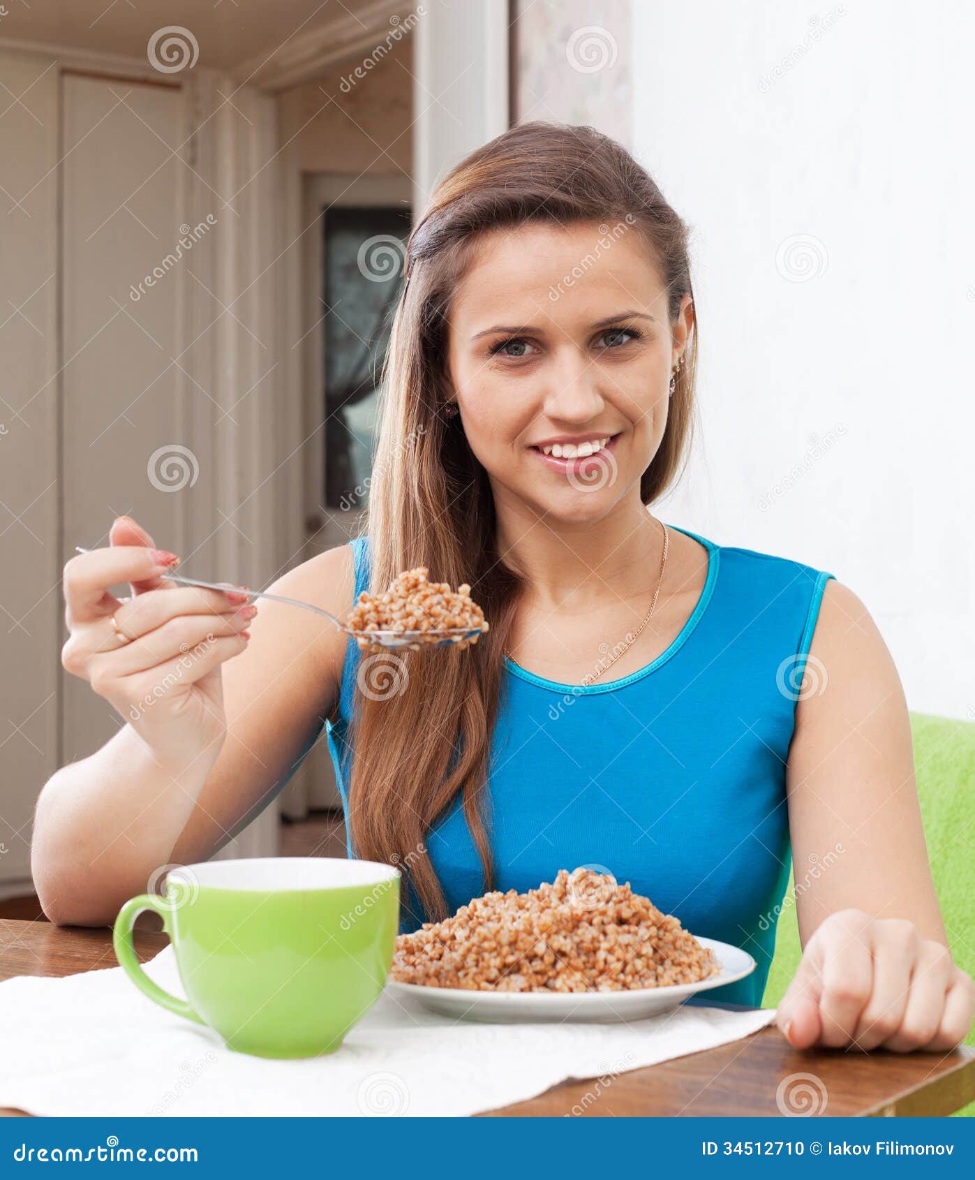 Woman Eats Buckwheat at Home Interior Stock Photo Image of domestic, girl 34512710