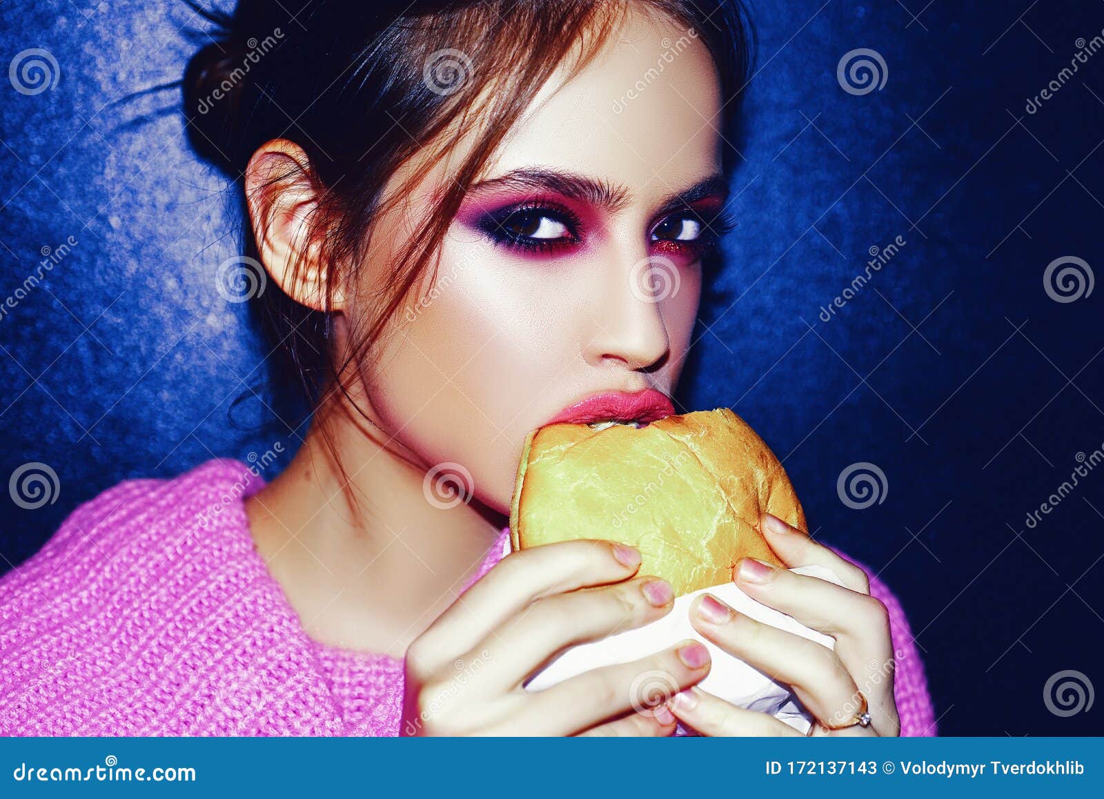 Woman Eats a Burger, Food. Food Porn. Teen Girls Enjoying Delicious Burgers  in Cafe Stock Image - Image of brushing, eyebrows: 172137143