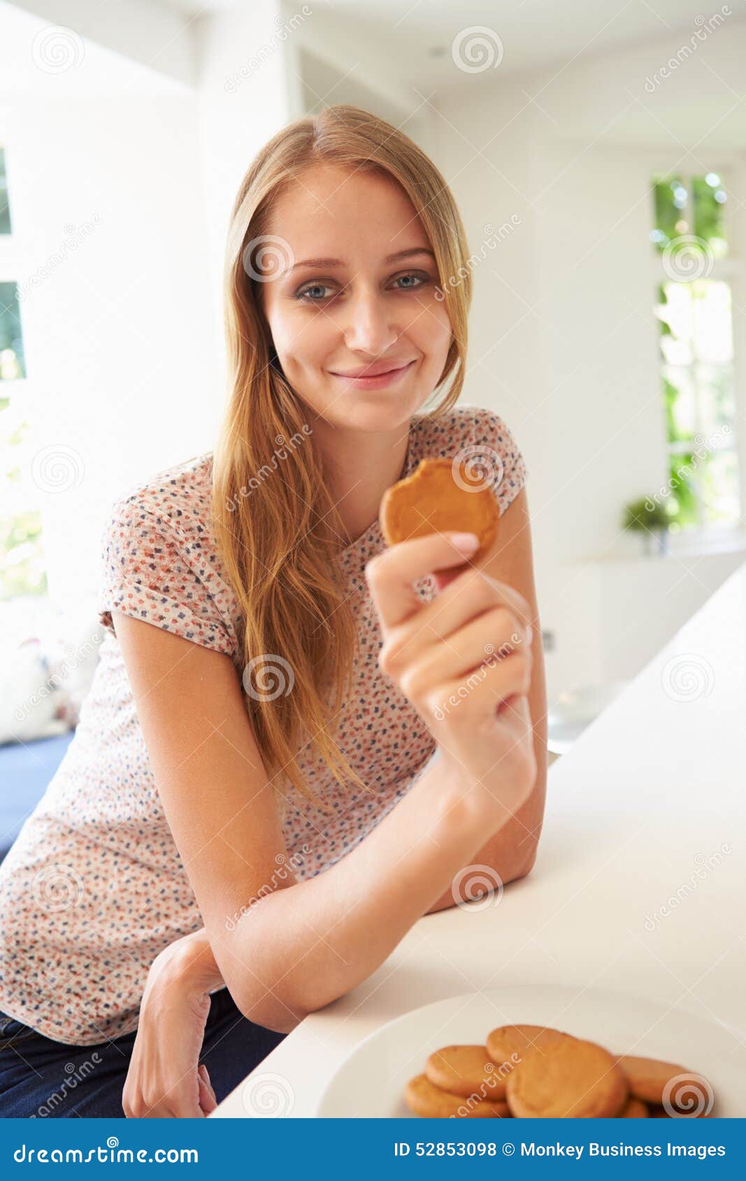 Woman Eats Ginger Biscuit To Stop Nausea of Morning Sickness Stock Photo Image of female