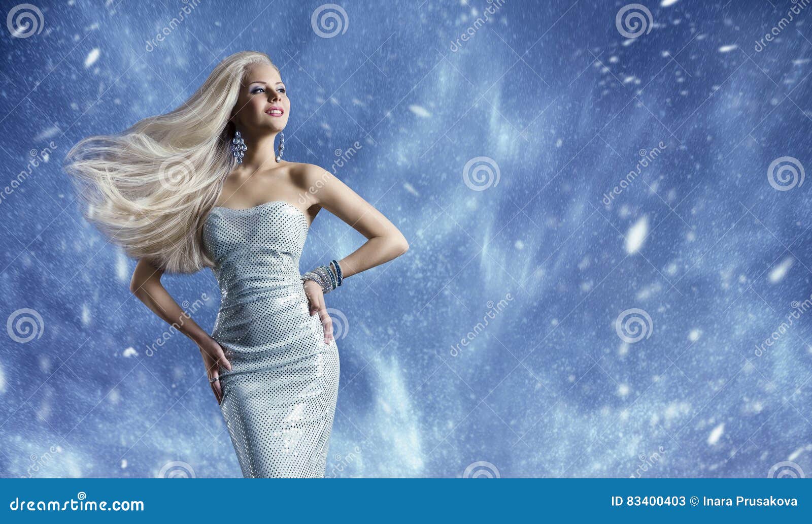 woman elegant fashion dress, long hair waving wind, winter beauty
