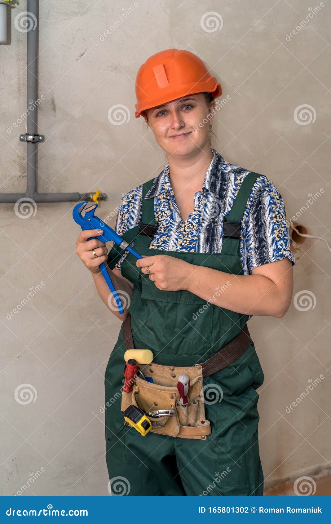 Woman Engineer with Tool Belt and Adjustable Key Stock Photo - Image of ...