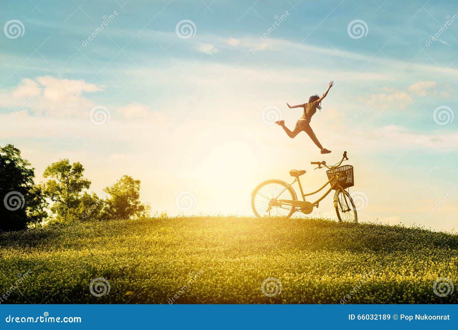 woman enjoy holiday in the park. she was jumping with happiness