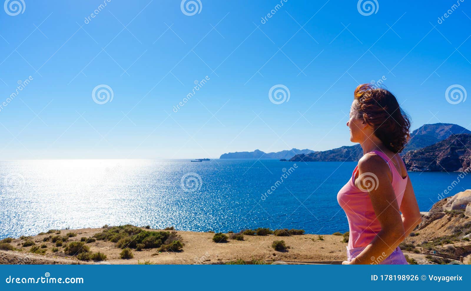 woman enjoy sea breeze