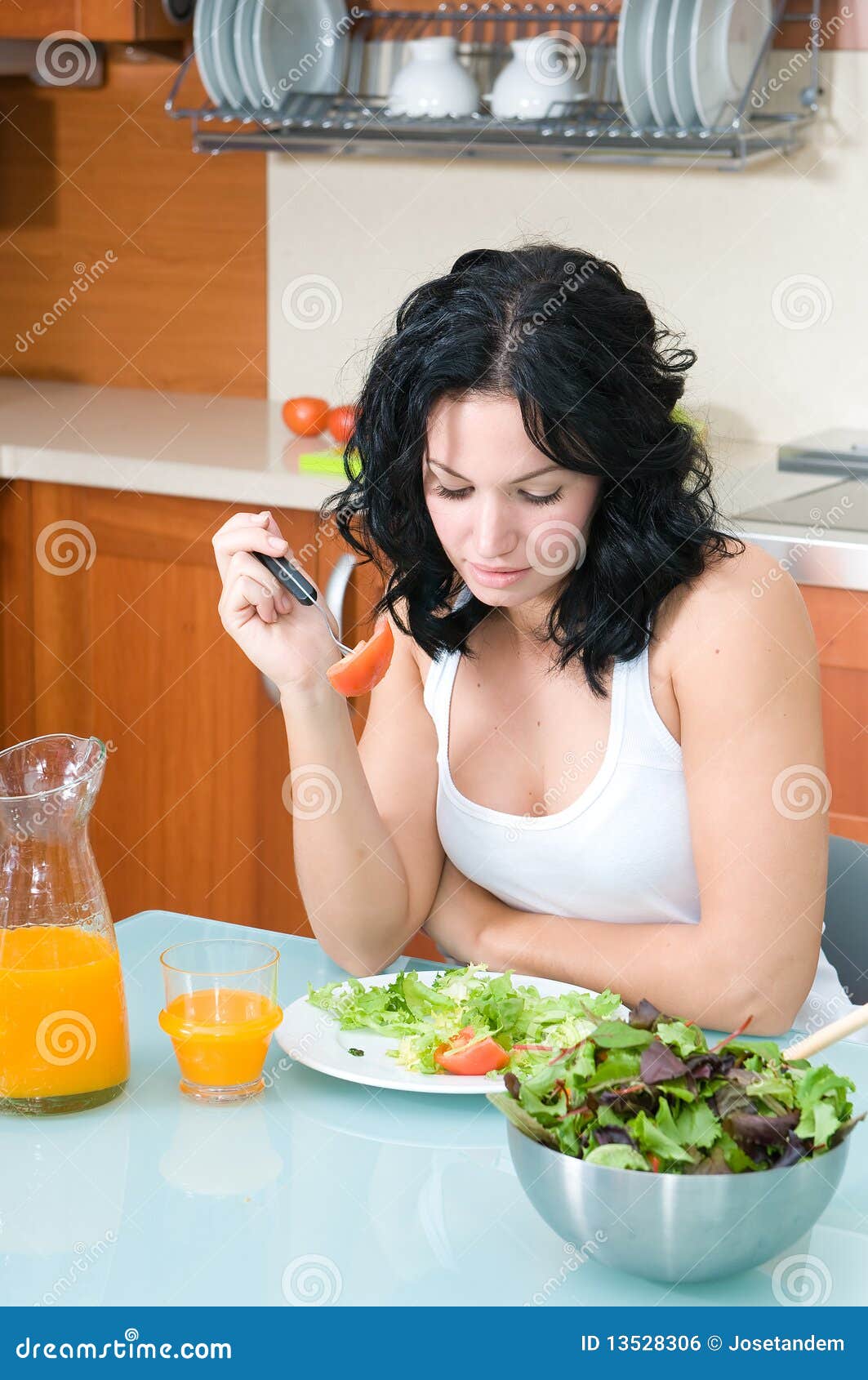 Woman enjoying her salad stock photo. Image of lifestyle 13528306