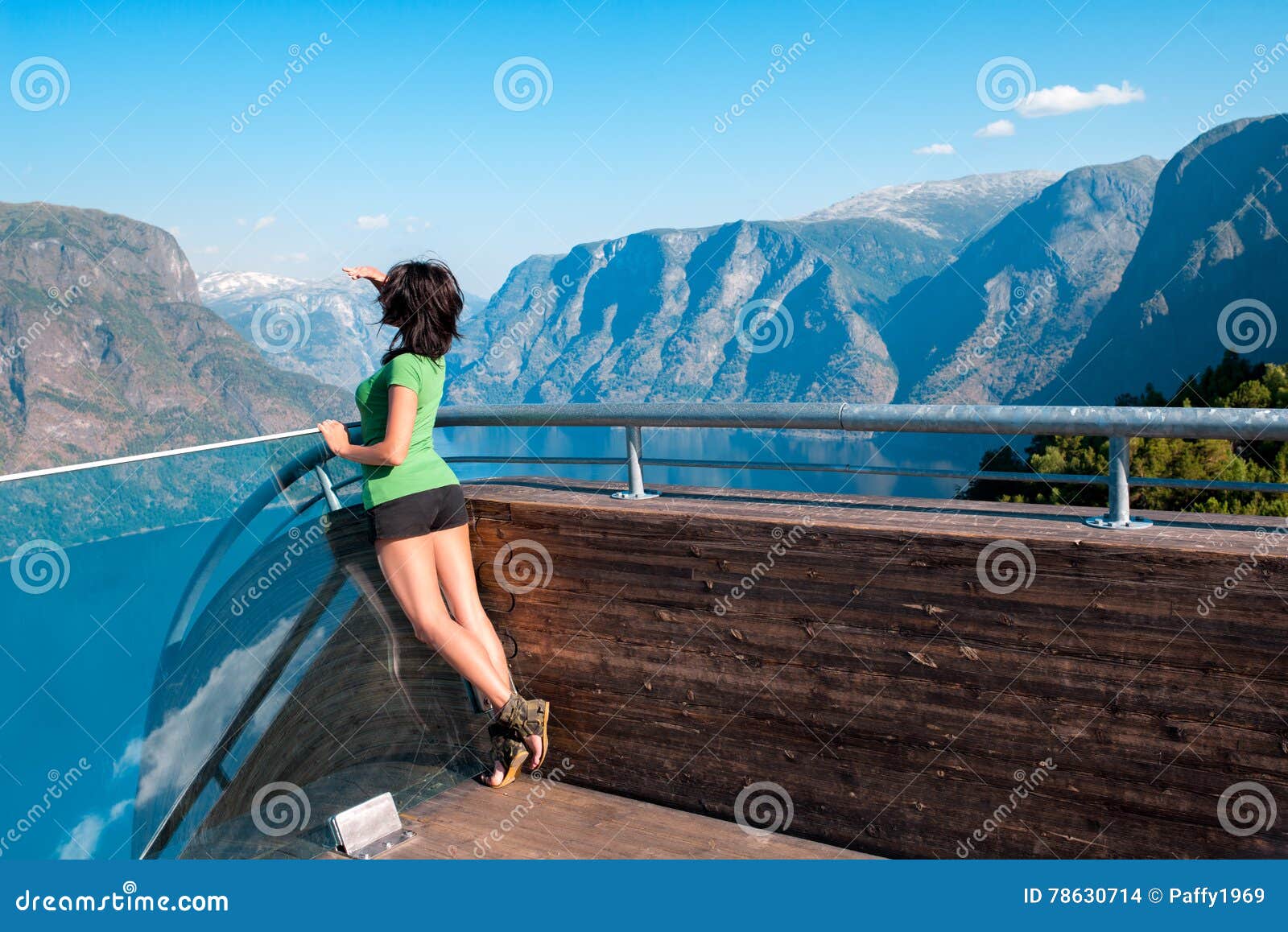 woman enjoying scenics from stegastein viewpoint