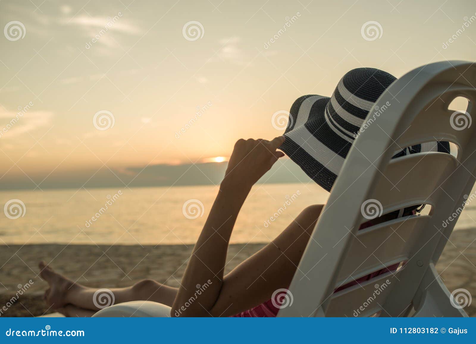 Woman enjoying sunset stock photo. Image of people, caucasian - 112803182
