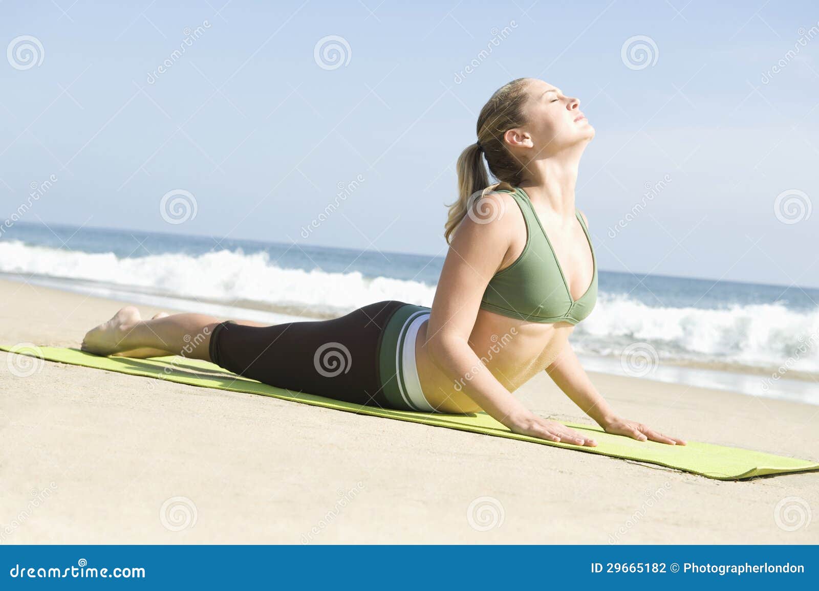 Woman Exercising on Yoga Mat at Beach Stock Photo Image of full