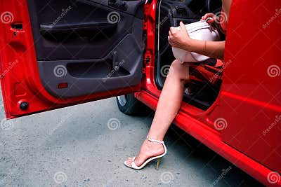 Woman exiting car stock image. Image of shapely, adult - 10312137