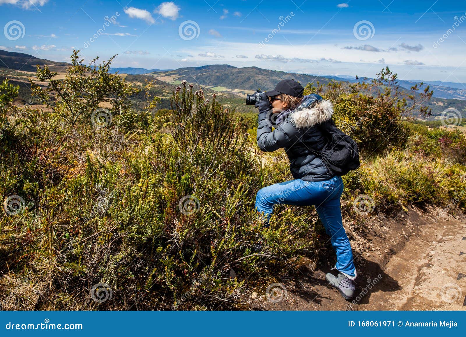 woman exploring the nature of a beautiful paramo at the department of cundinamarca in colombia