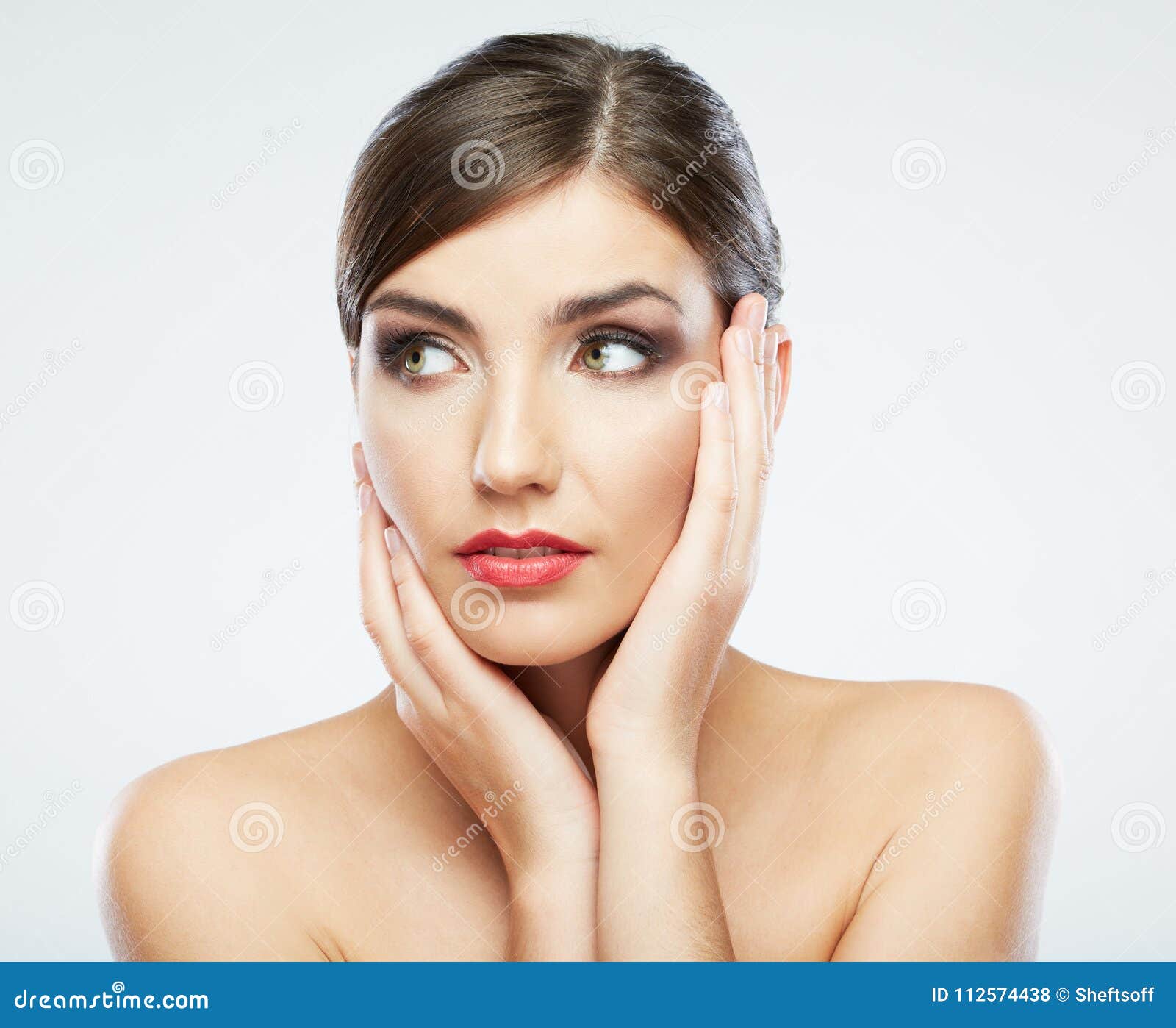 Woman face close up portrait. Young female model poses. - SuperStock