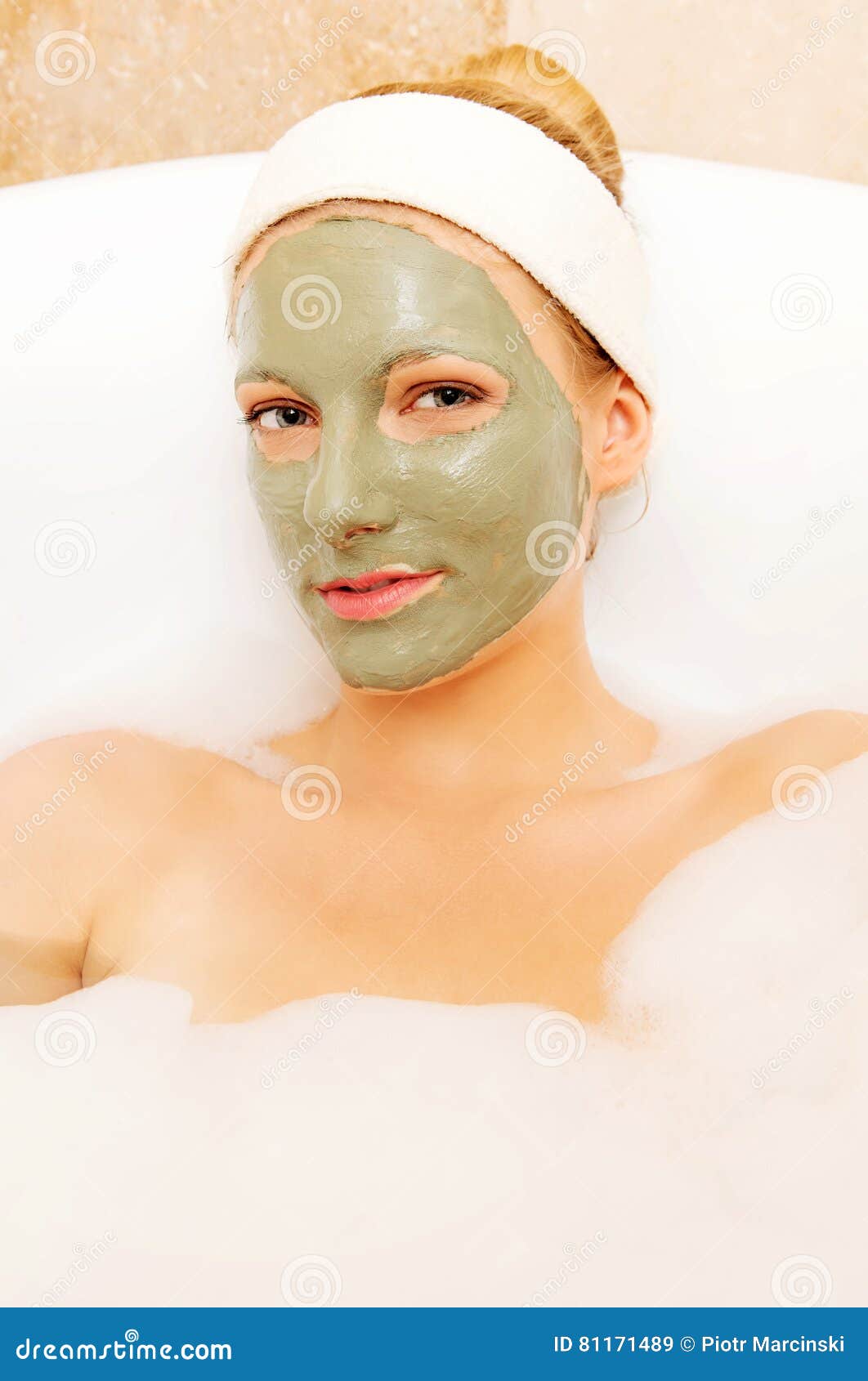 woman with facial mud mask. dayspa