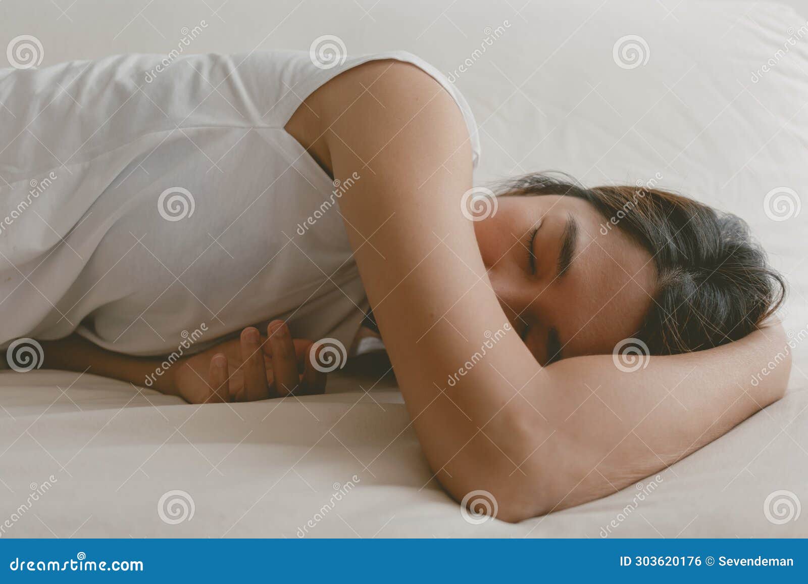 Woman Fall Asleep on the Sofa As she Tired and Sick. Stock Photo