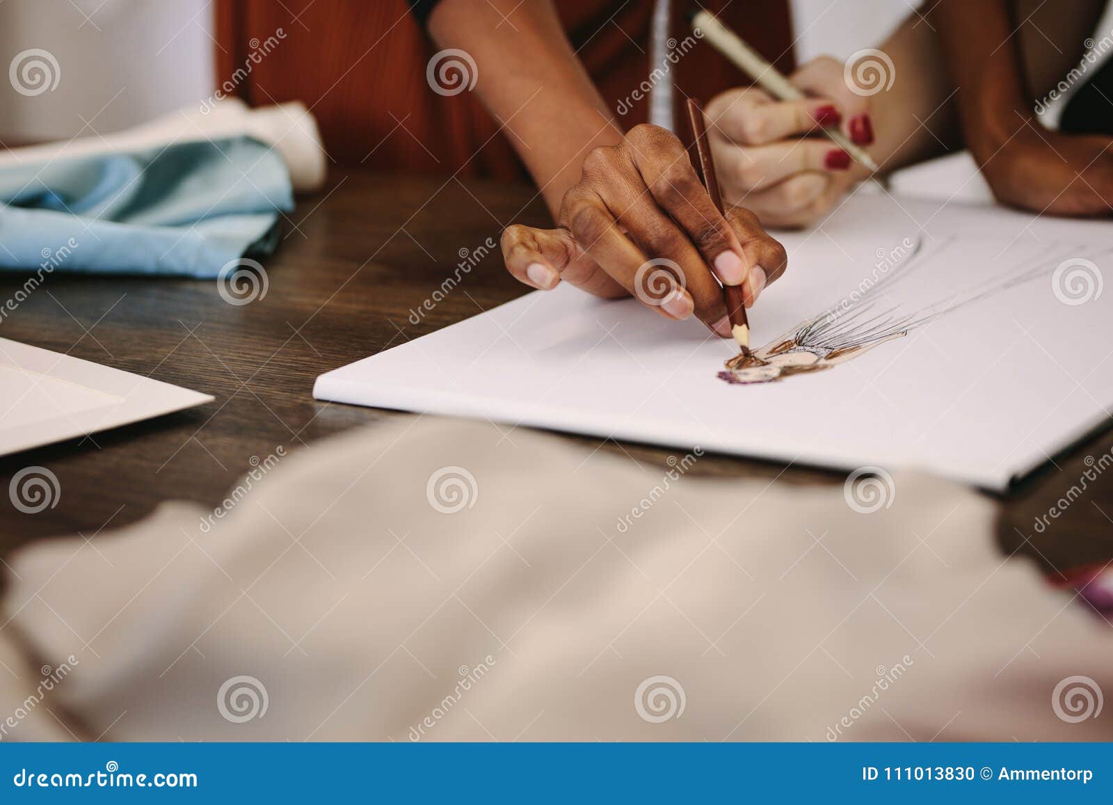 Woman Fashion Designers Making Designs on Drawing Paper Stock Photo ...