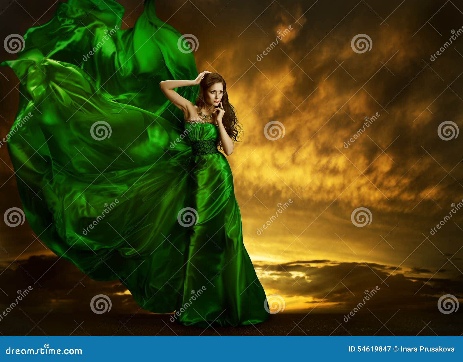 woman fashion dress fluttering wind, green silk gown fabric