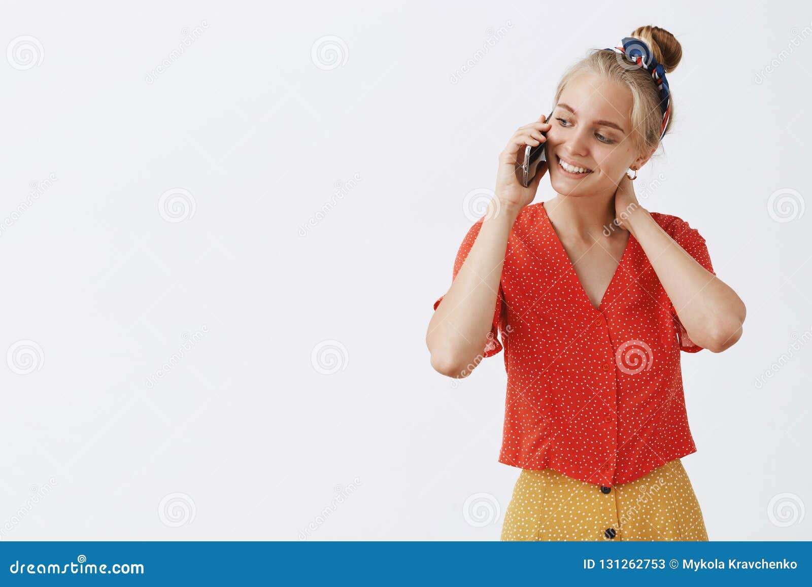 Woman Feeling Shy and Tender Flirting while Talking on Phone. Portrait ...