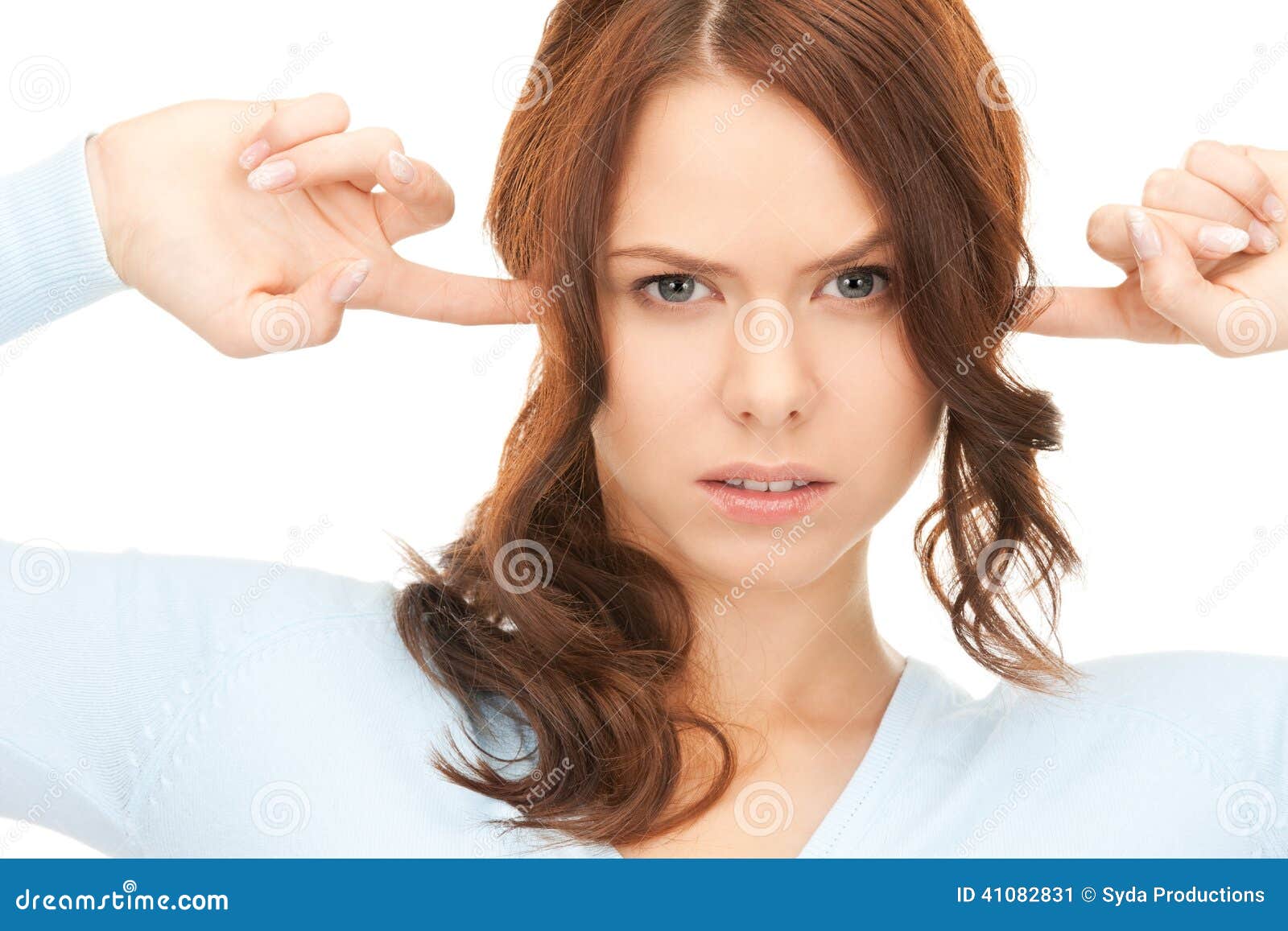 Woman with fingers in ears stock image. Image of despair 41082831