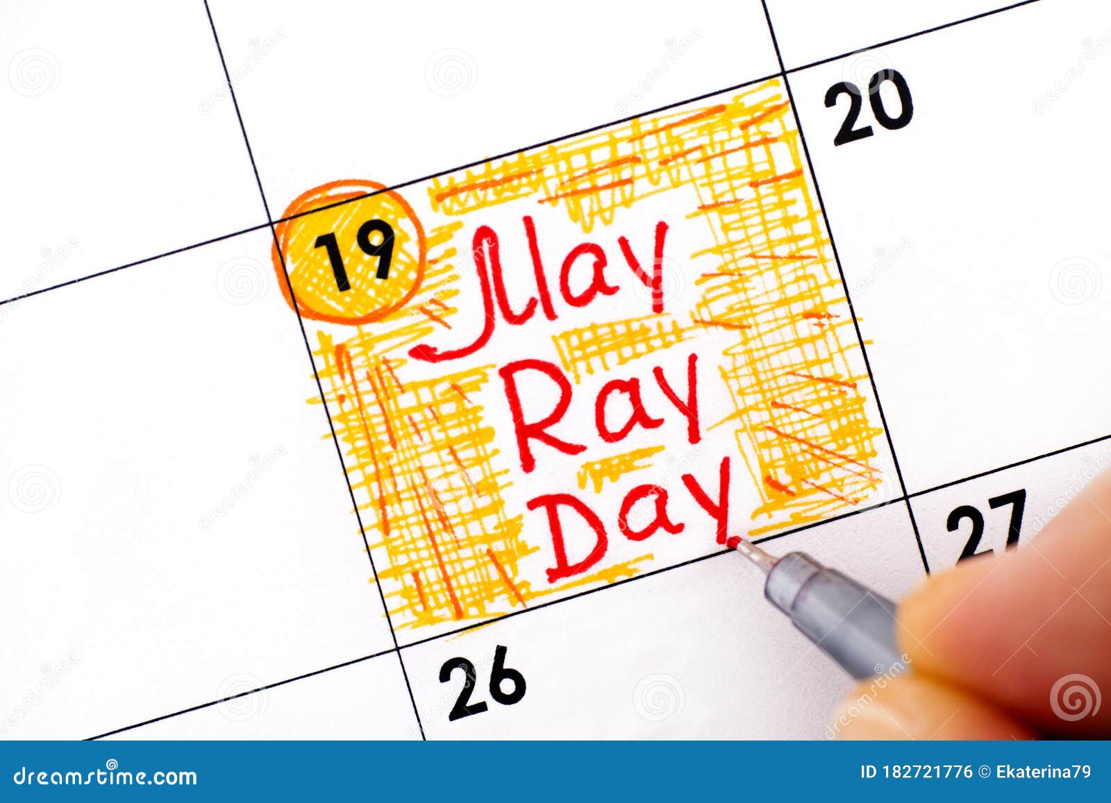 Woman Fingers with Pen Writing Reminder May Ray Day in Calendar