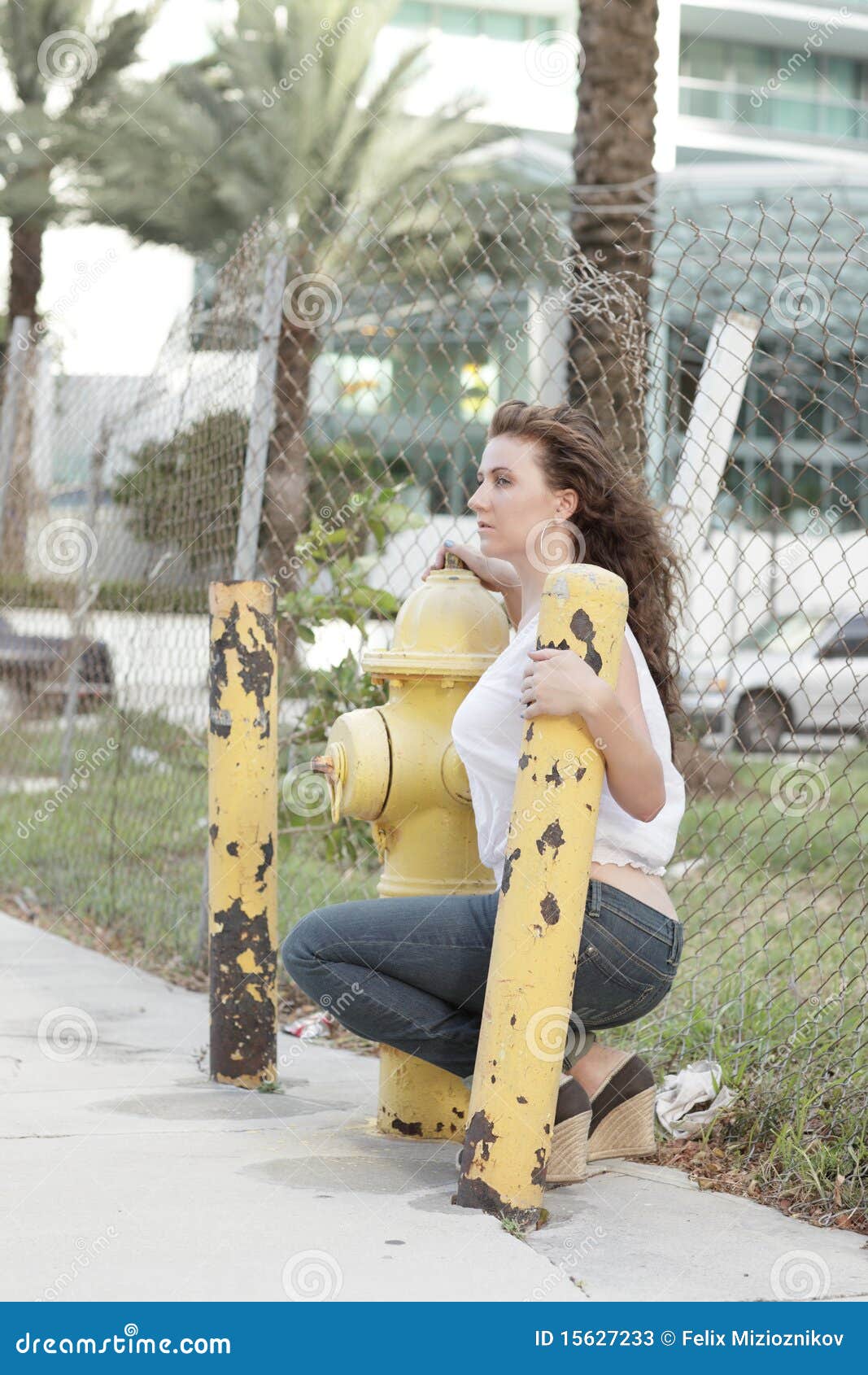 Woman By A Fire Hydrant Stock Photos Image 15627233